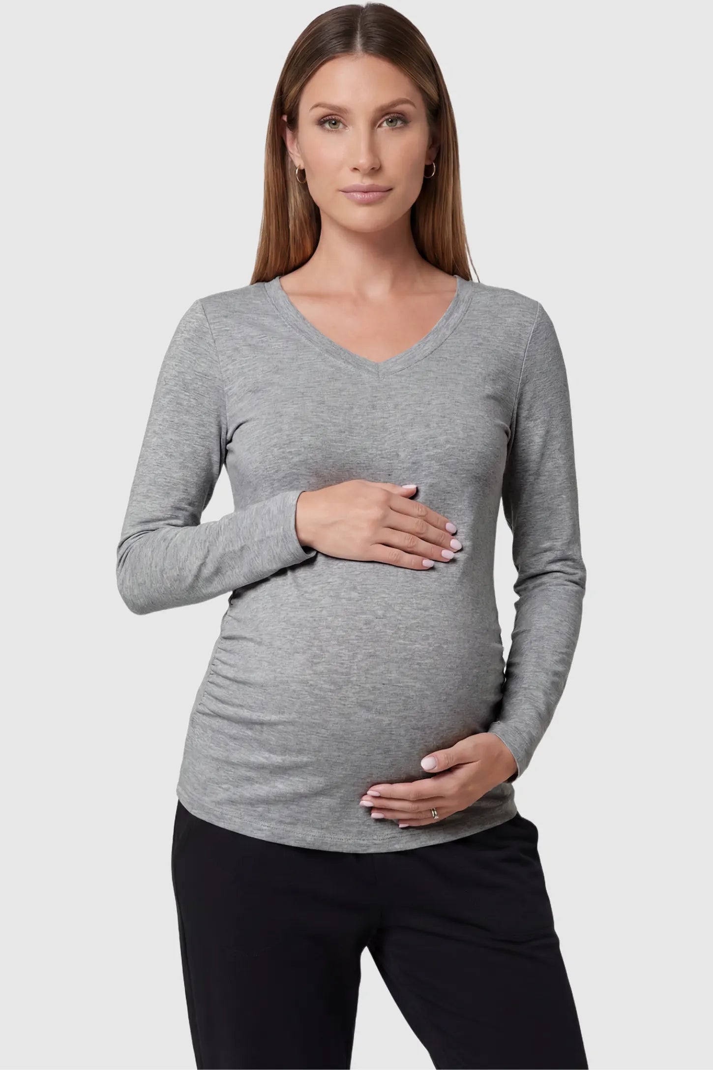 Soft Knit Long Sleeve V-Neck Maternity Top Soft knit long sleeve V-neck maternity top in gray with flattering V-neckline and long sleeves, front view on pregnant model