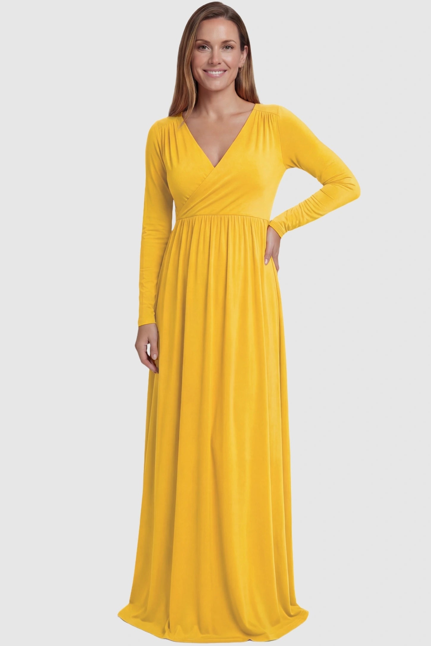 Off-Shoulder Long Sleeve Trailing Maxi Maternity Dress Off-shoulder long sleeve trailing maxi maternity dress in mustard yellow featuring dramatic full train and elegant long sleeves in full body view on a postpartum model