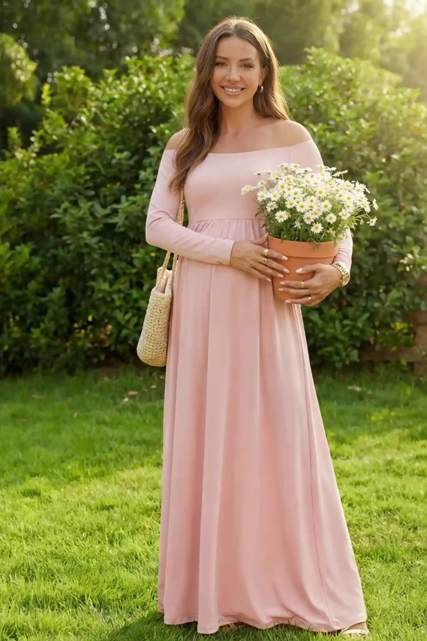 Off-shoulder long sleeve full skirt maxi maternity dress in pink with elegant off-shoulder design, on editorial lifestyle model