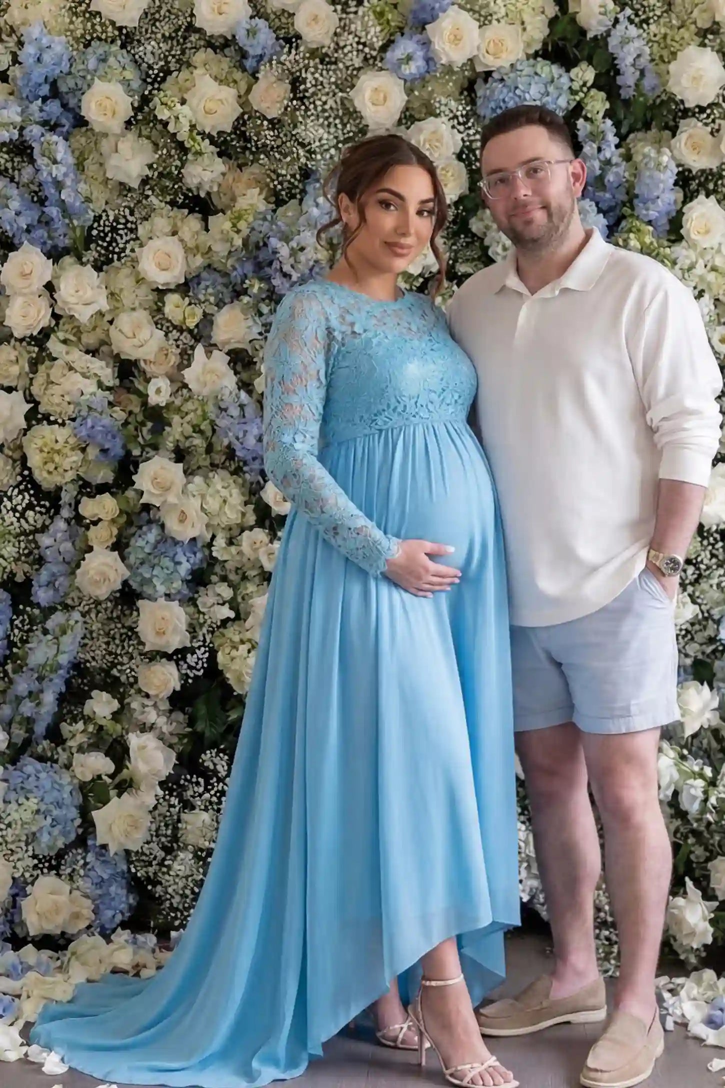Lace Long Sleeve Full Skirt Maxi Maternity Dress Lace long sleeve full skirt maxi maternity dress in light blue with elegant long sleeves & lace bodice, front view on pregnant model