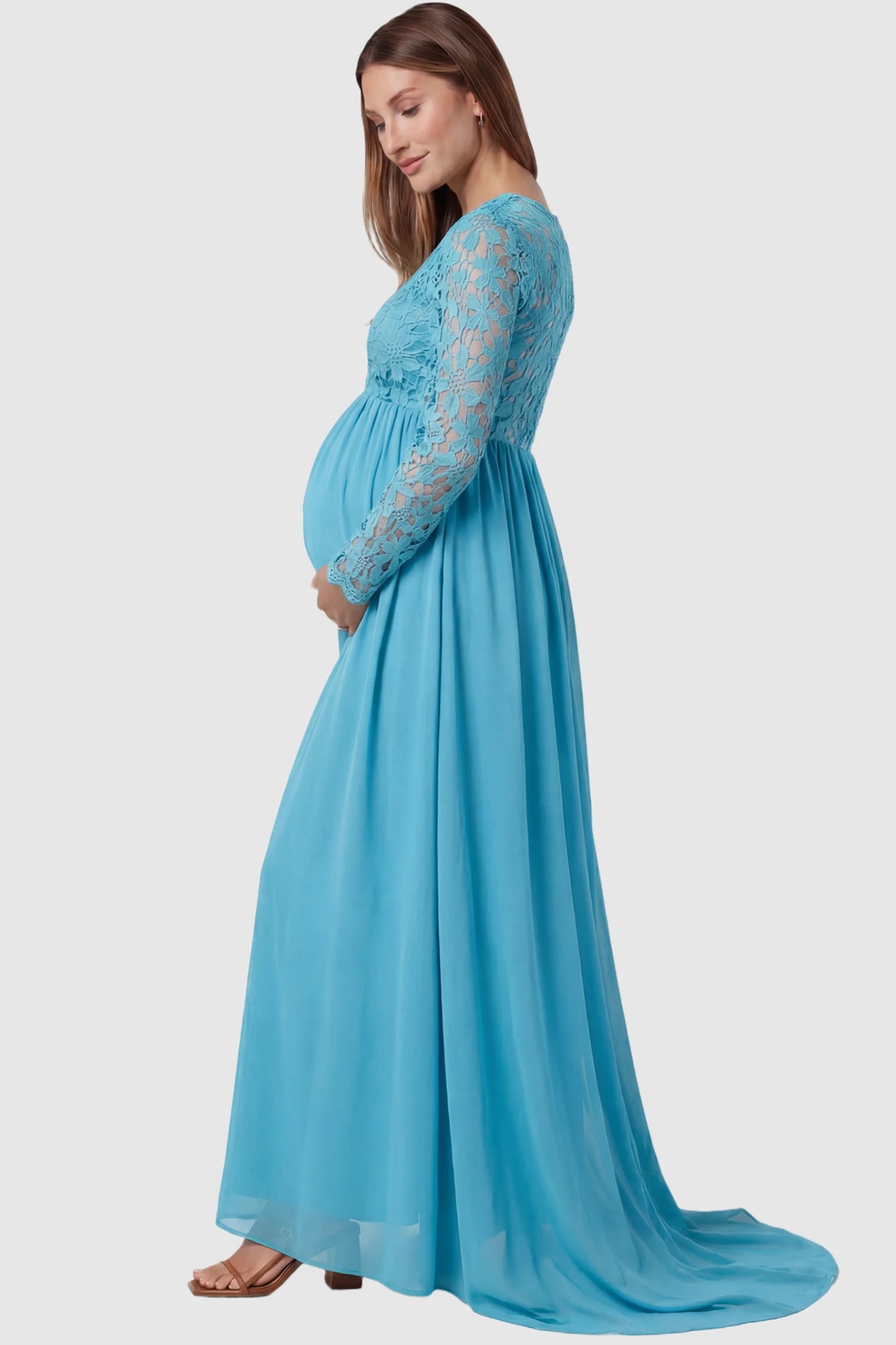 Lace Long Sleeve Full Skirt Maxi Maternity Dress Lace long sleeve full skirt maxi maternity dress in light blue with elegant long sleeves & lace bodice, side view on pregnant model