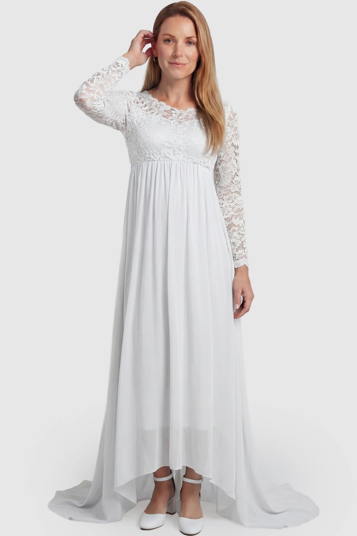 Lace Long Sleeve Full Skirt Maxi Maternity Dress Lace long sleeve full skirt maxi maternity dress in white with elegant long sleeves & lace bodice, front view on postpartum model