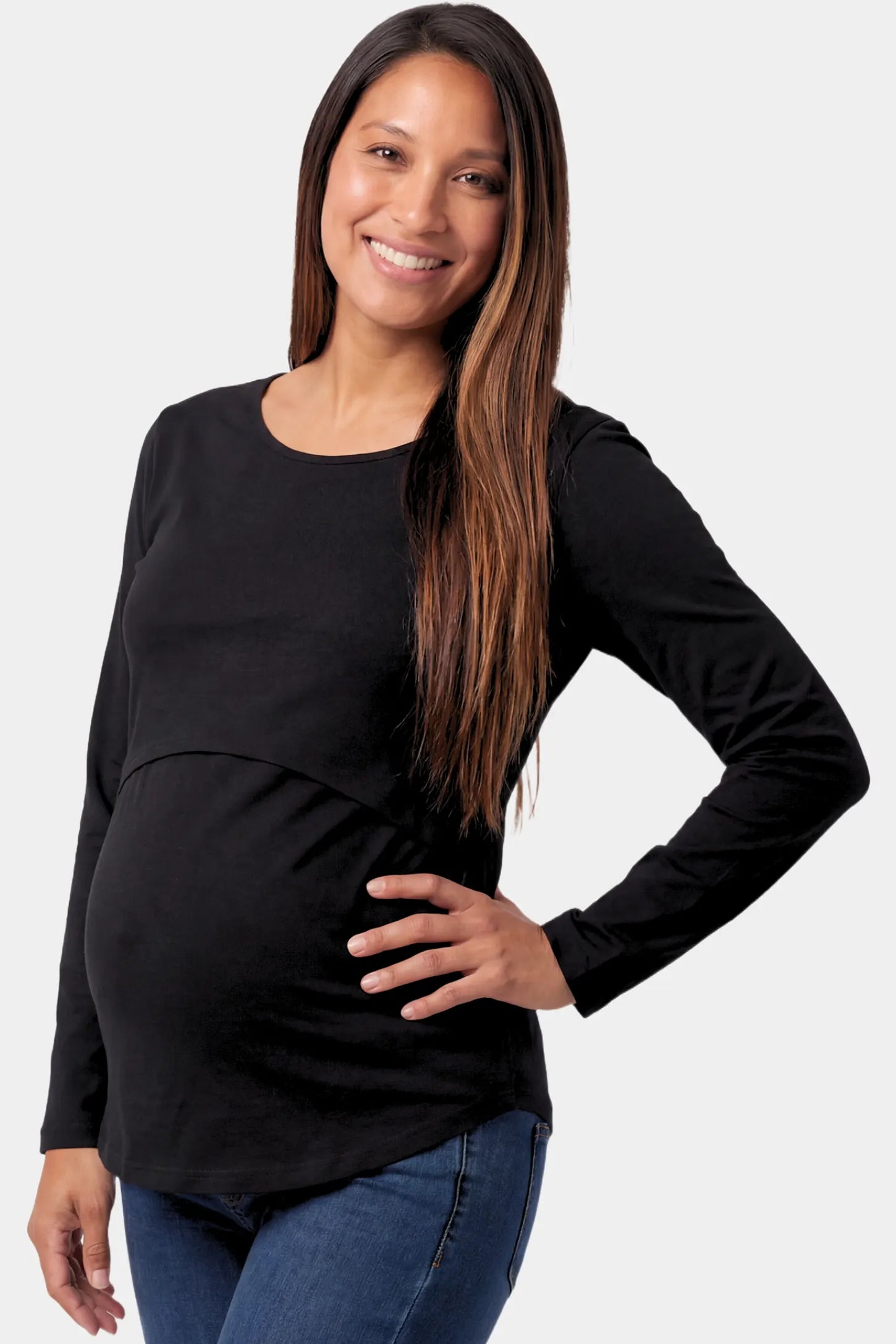 Basic Long Sleeve Maternity & Nursing Top Basic Long Sleeve Maternity & Nursing Top in black featuring a relaxed crew neck and nursing-friendly design on a pregnant model.