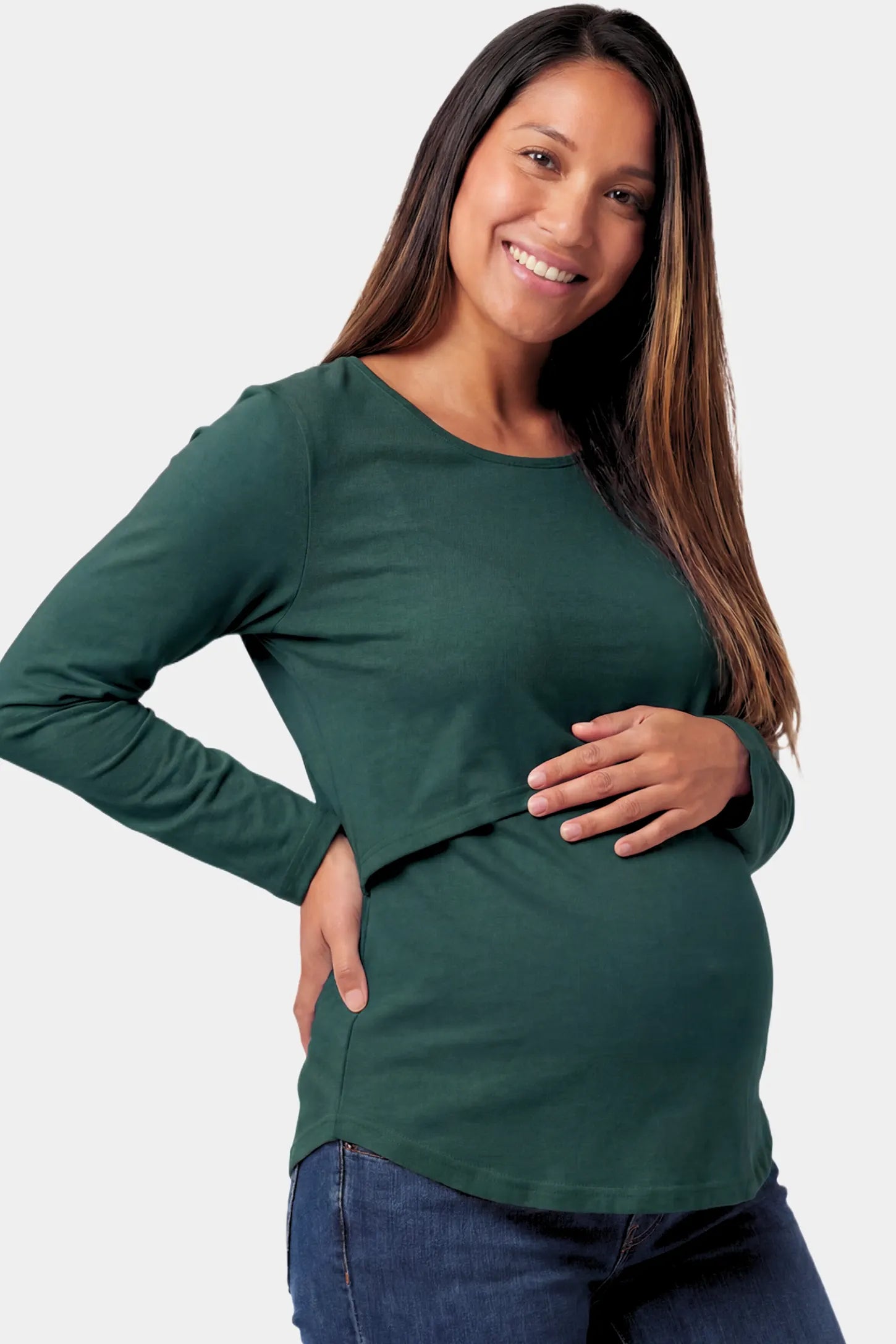 Basic Long Sleeve Maternity & Nursing Top Basic Long Sleeve Maternity & Nursing Top in green featuring a relaxed crew neck and nursing-friendly design on a pregnant model.