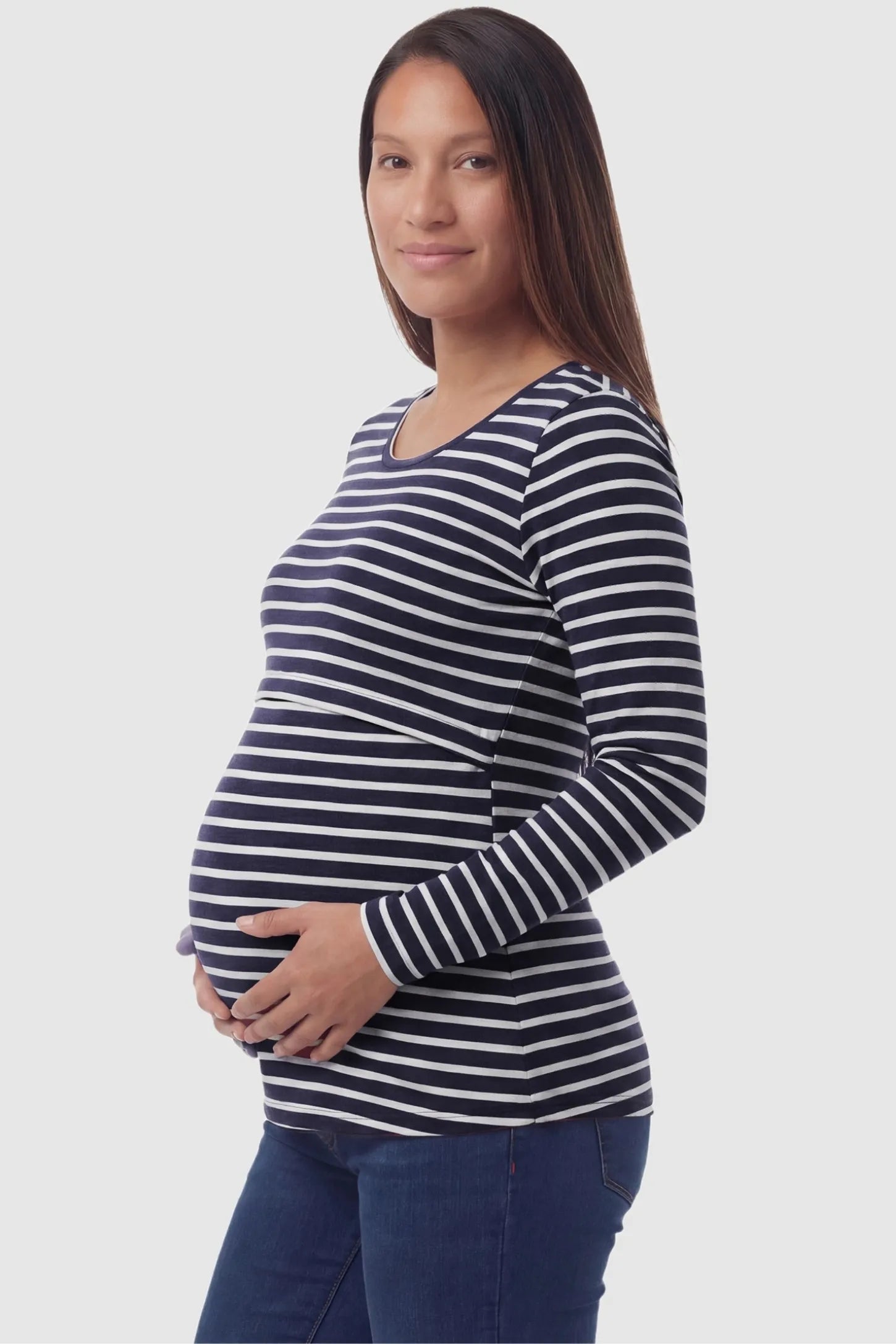 Pull-Up Nursing Opening Scoop Neck Maternity & Nursing Top Pull up nursing opening scoop neck maternity and nursing top in black and white stripes featuring striped print & long-sleeve shown in side view on a pregnant model