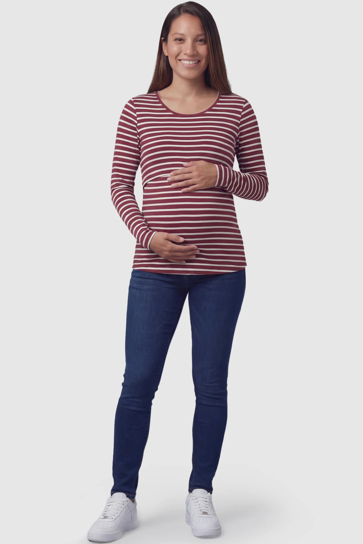 Pull-Up Nursing Opening Scoop Neck Maternity & Nursing Top Pull up nursing opening scoop neck maternity and nursing top in burgundy featuring striped print & long-sleeve shown in full body view on a pregnant model