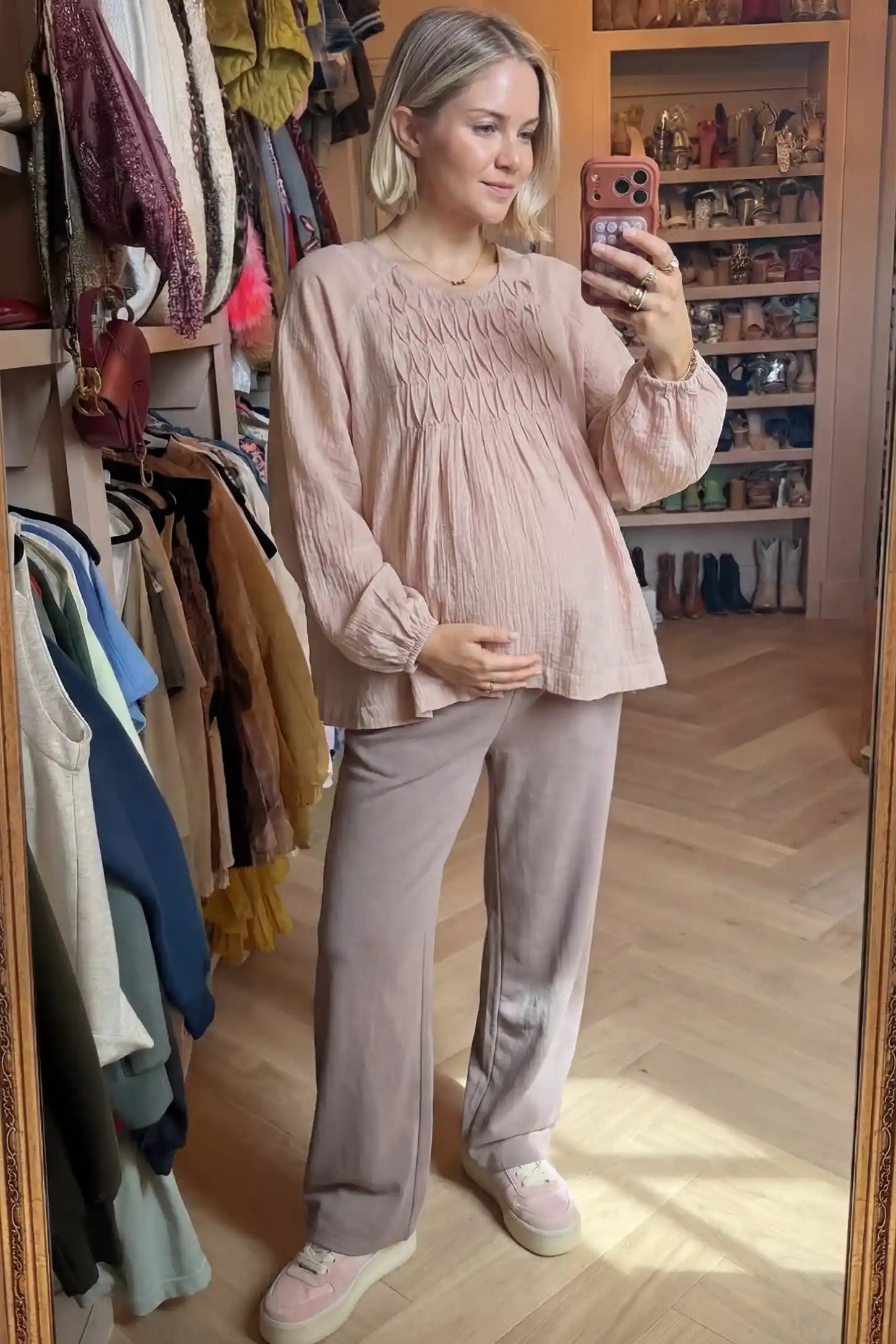 Long Sleeve Round Neck Maternity Blouse Long sleeve round neck maternity blouse in pink with elegant long sleeve, front view on pregnant model