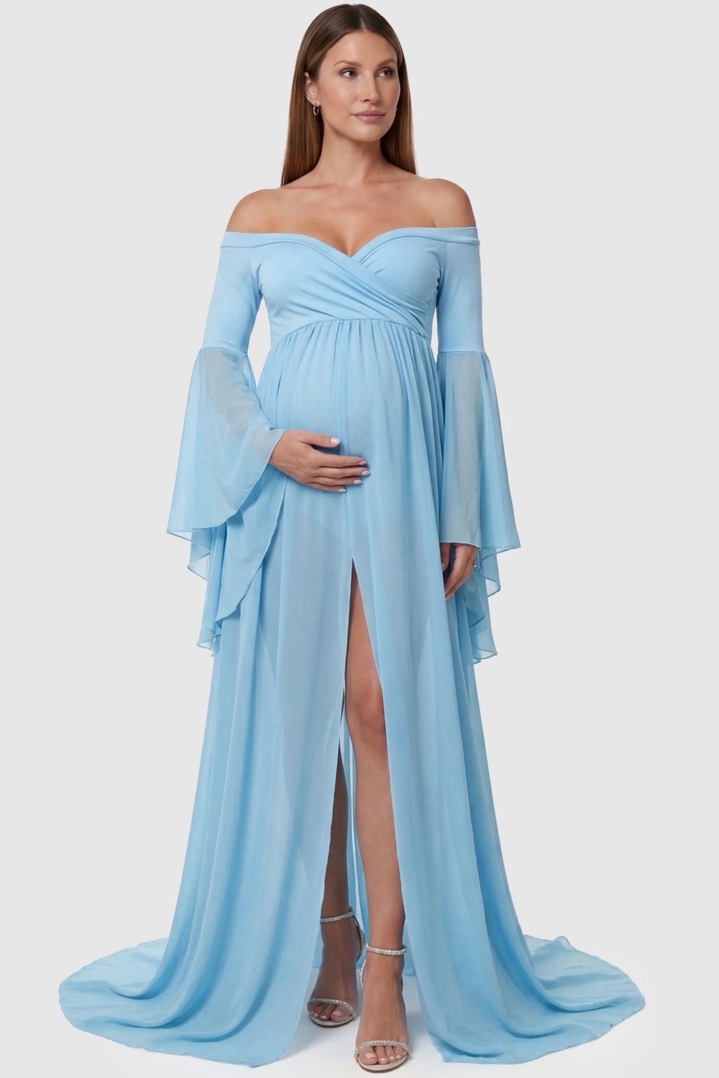 Off-the-Shoulder Long Train Maxi Maternity Dress Off-the-shoulder long train maxi maternity dress in light blue featuring a high front-slit in full body front view on a pregnant model