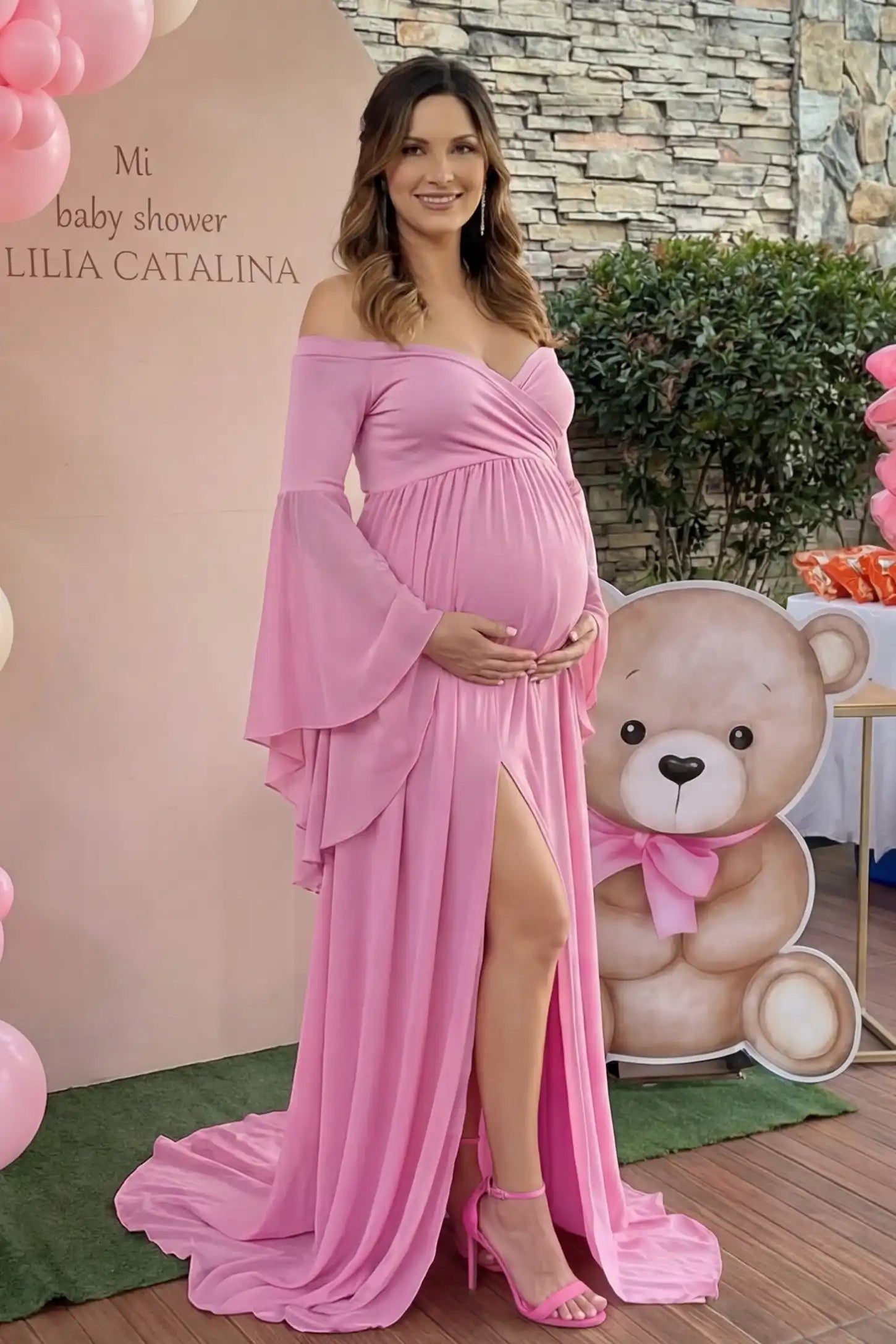 Off-the-Shoulder Long Train Maxi Maternity Dress Off-the-shoulder long train maxi maternity dress in lime pink featuring long bell sleeves in front view on a UGC model