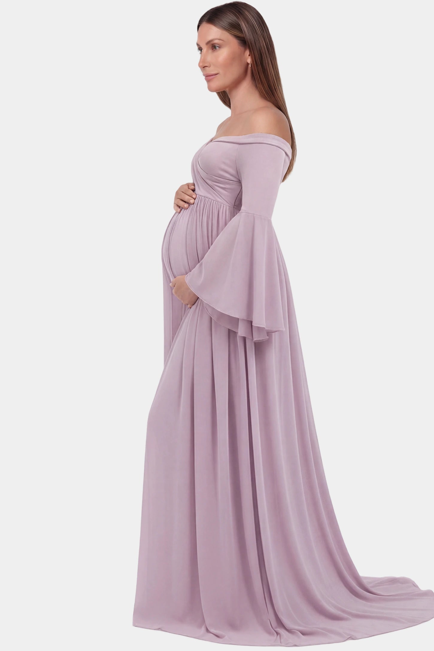 Off-the-Shoulder Long Train Maxi Maternity Dress Off-the-shoulder long train maxi maternity dress in pink featuring flowing chiffon silhouette in full body side view on a pregnant model
