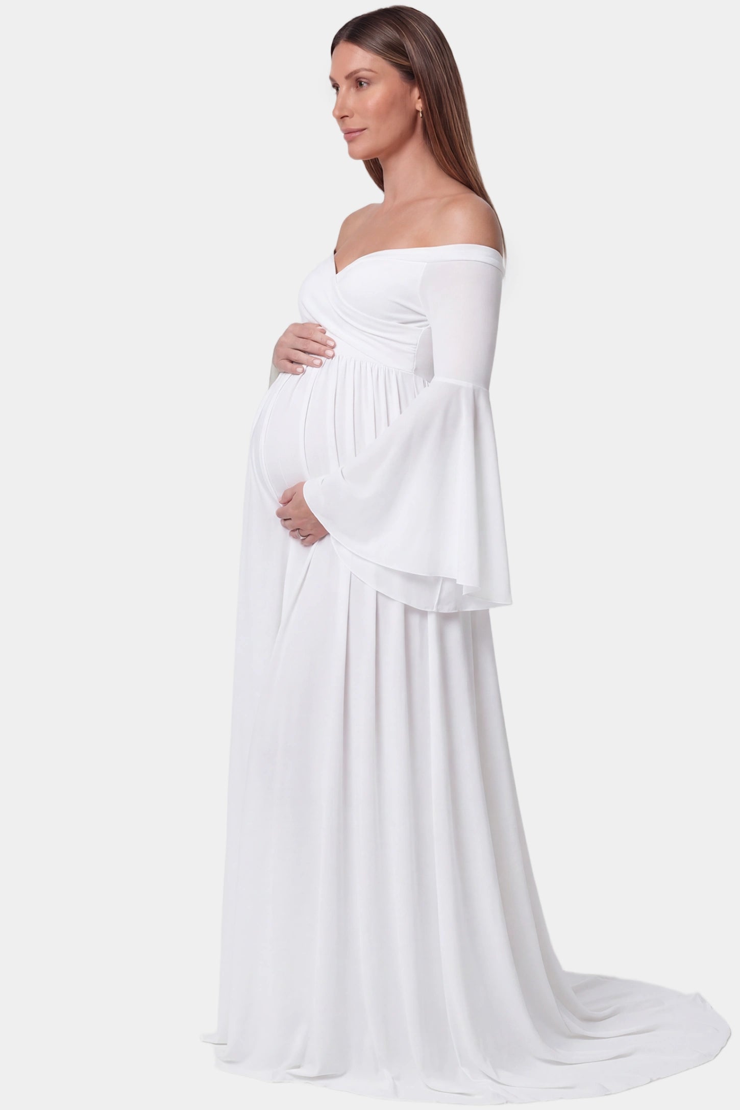 Off-the-Shoulder Long Train Maxi Maternity Dress Off-the-shoulder long train maxi maternity dress in white featuring flowing chiffon silhouette in full body side view on a pregnant model