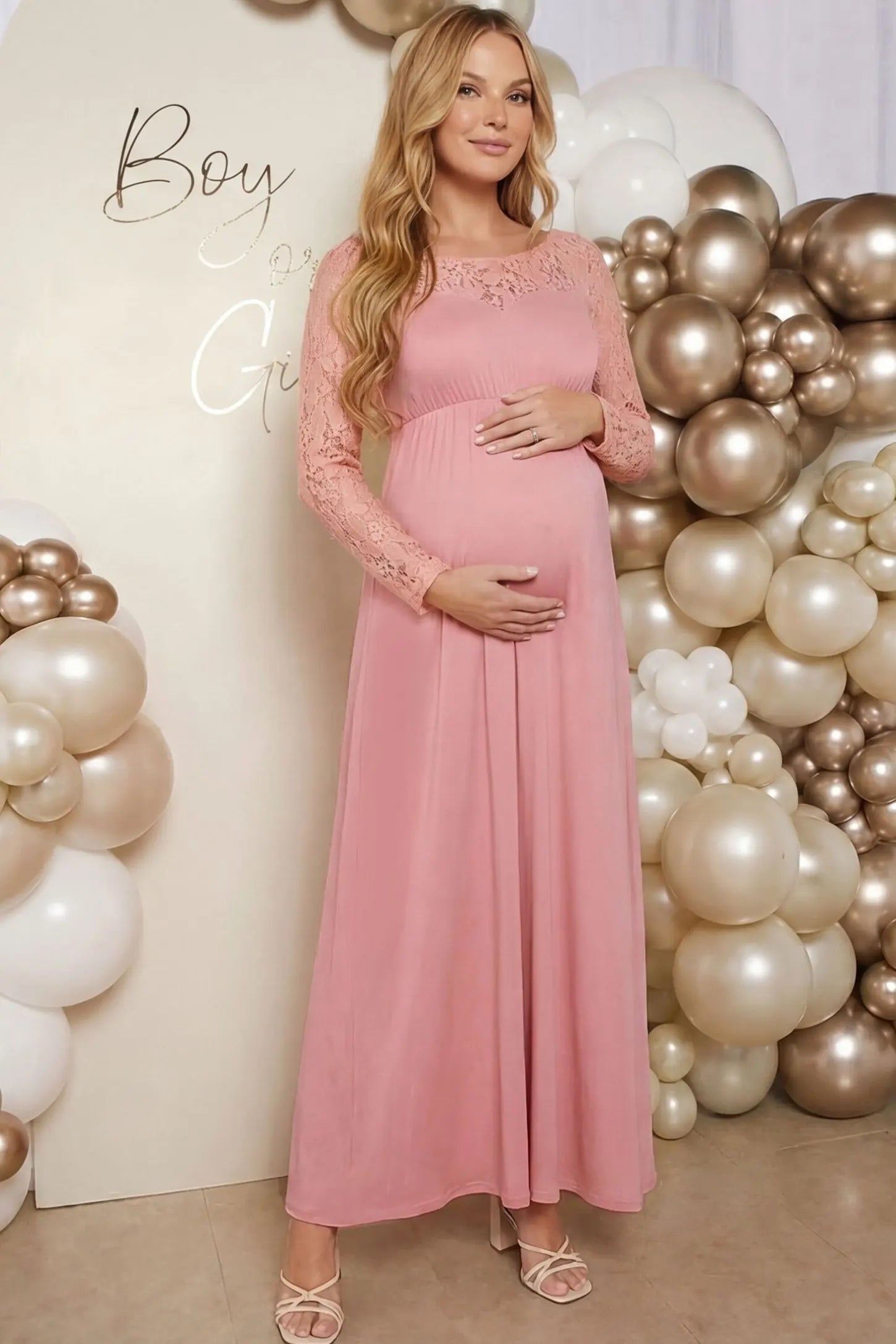 Acrylic Lace Long Sleeve Floor-Length Maternity Dress Acrylic Lace Long Sleeve Floor-Length Maternity Dress in Pink featuring a round neck on a pregnant model.