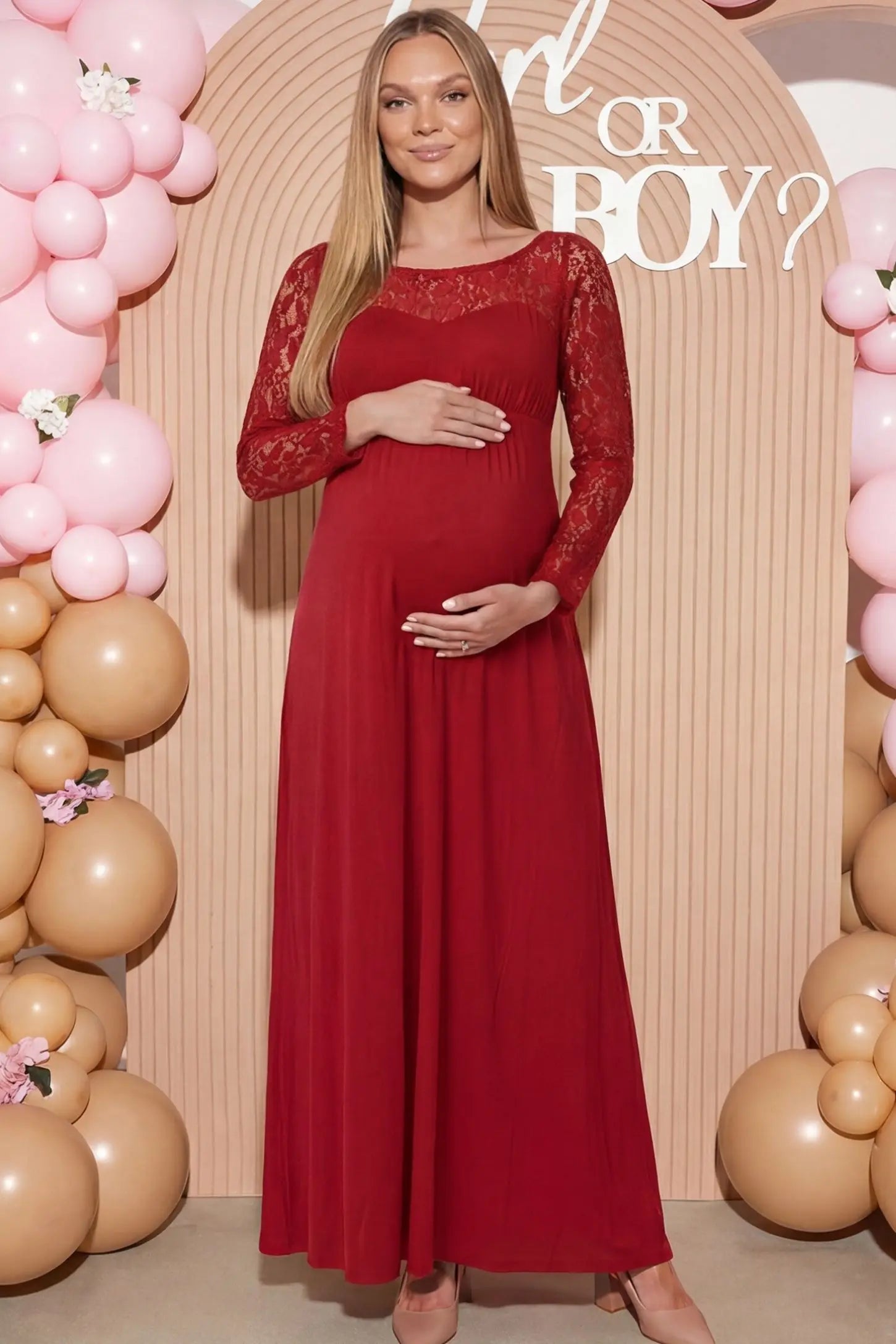 Acrylic Lace Long Sleeve Floor-Length Maternity Dress Acrylic Lace Long Sleeve Floor-Length Maternity Dress in Red featuring a round neck on a pregnant model.