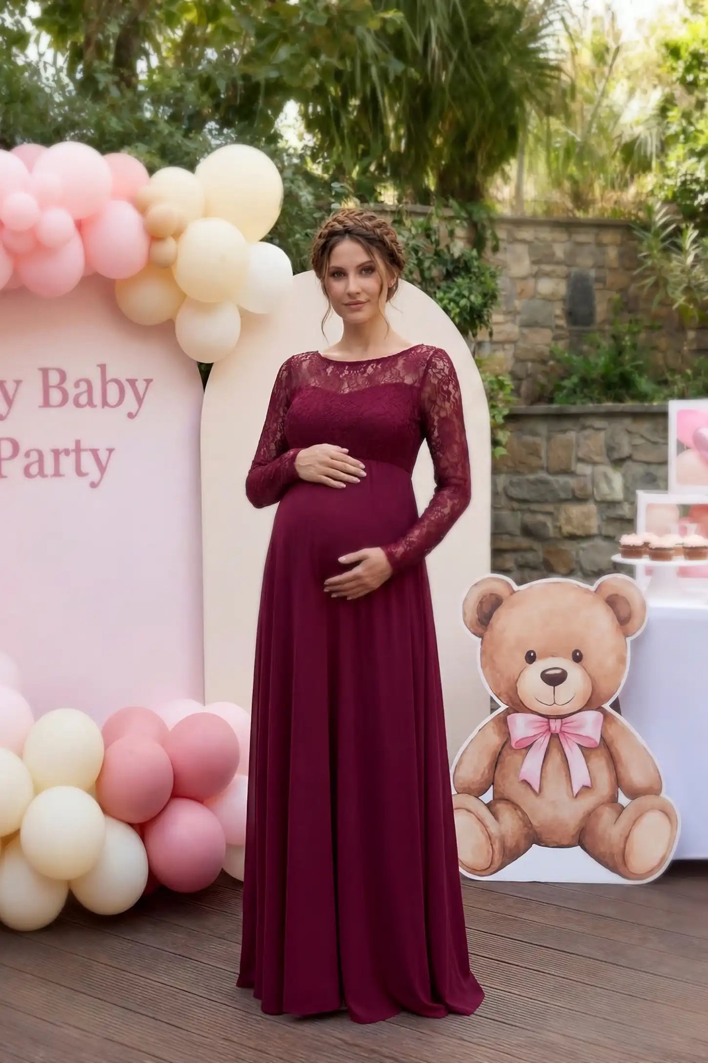 Acrylic Lace Long Sleeve Floor-Length Maternity Dress Acrylic Lace Long Sleeve Floor-Length Maternity Dress in Wine Red featuring a round neck on a pregnant model.