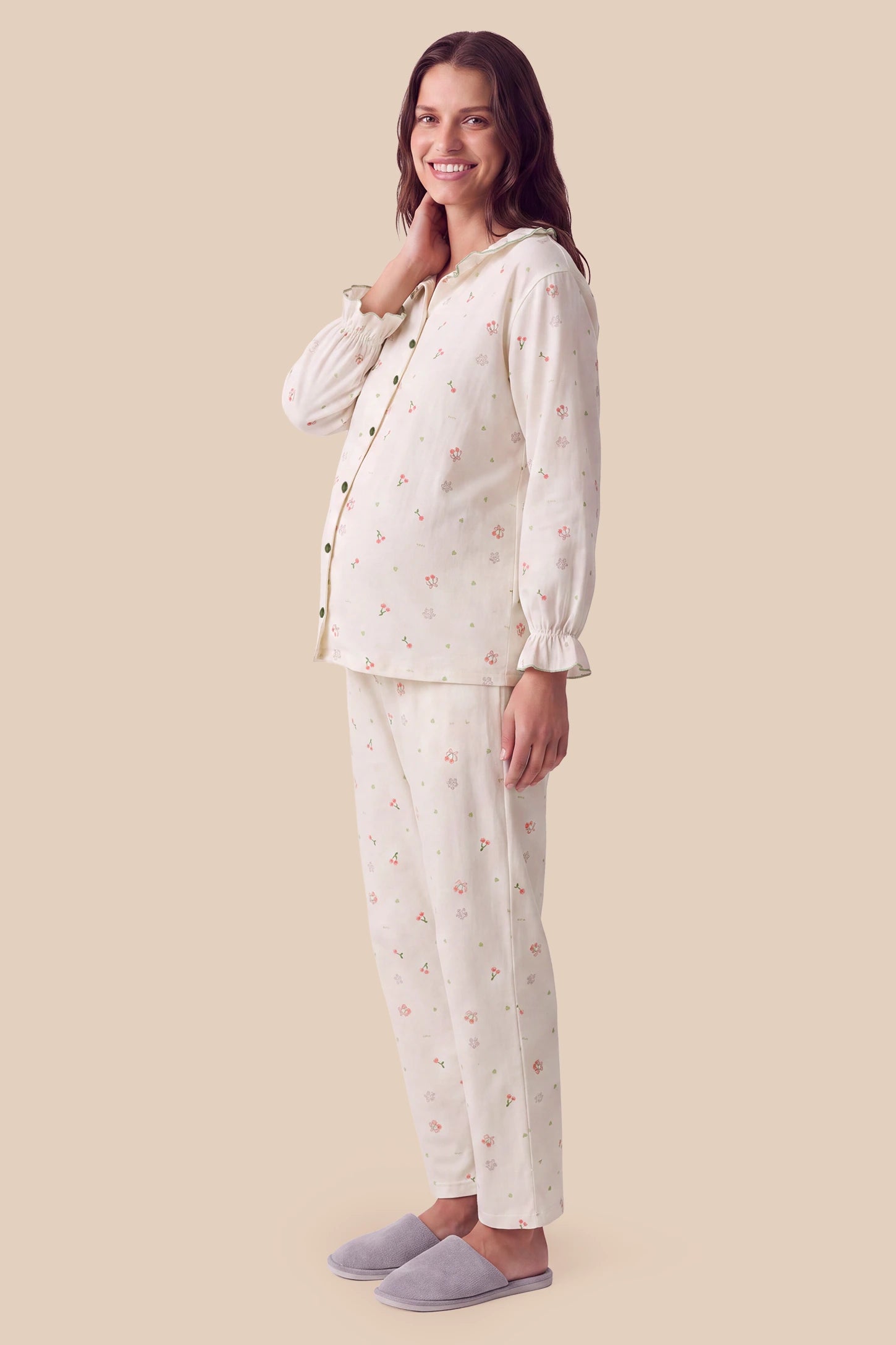 Luxury Cotton Air Knit Long Sleeve PJ Set in Cherry featuring a relaxed long sleeve top, adjustable waistband, long pants with side pockets, and a comfortable maternity-friendly silhouette on a pregnant model, side view.