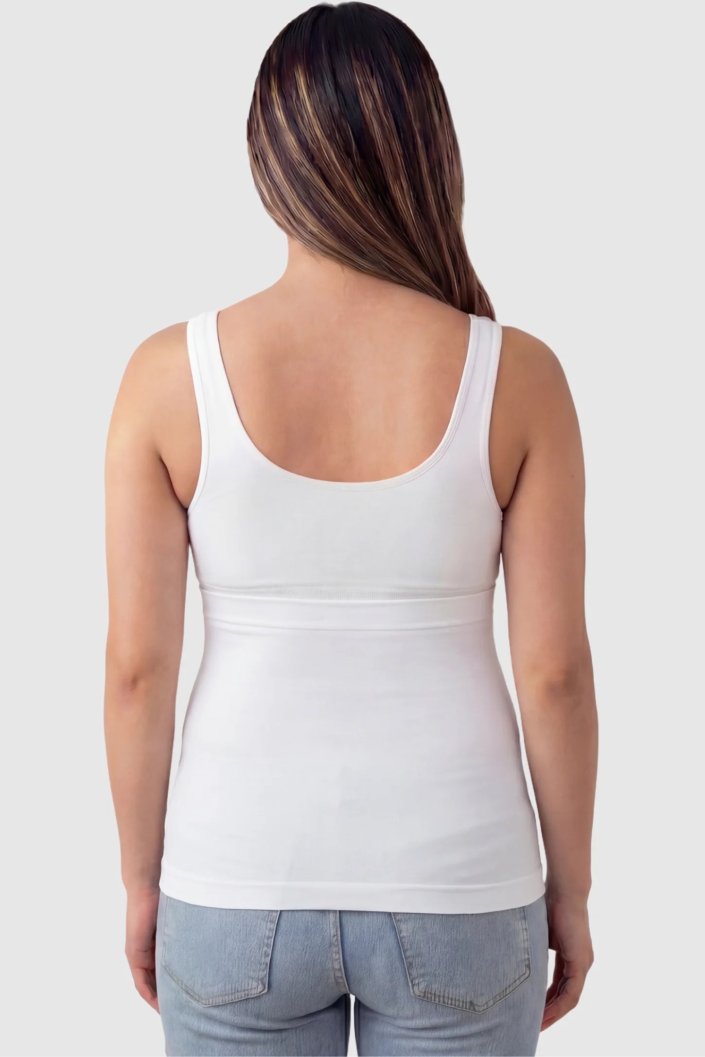 Seamless Support Maternity Belly Band Seamless Support Maternity Belly Band in white featuring wide high-rise fit and seamless tubular design on pregnant model.