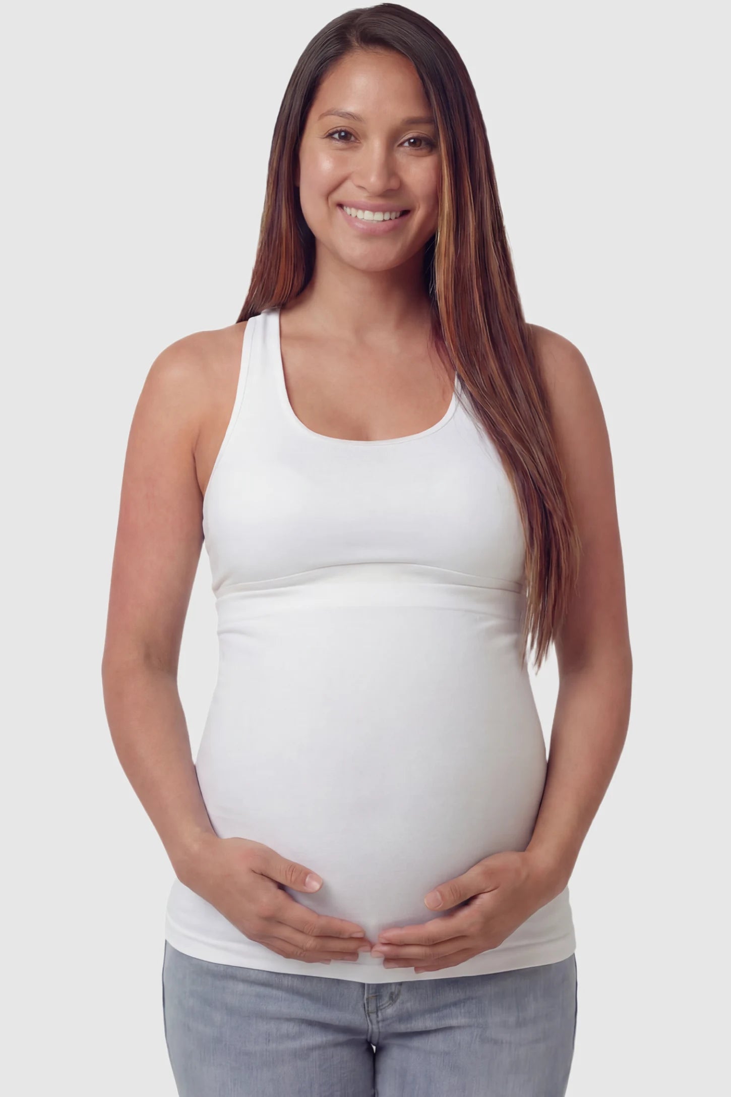Seamless Support Maternity Belly Band Seamless Support Maternity Belly Band in white featuring wide high-rise fit and seamless tubular design on pregnant model.