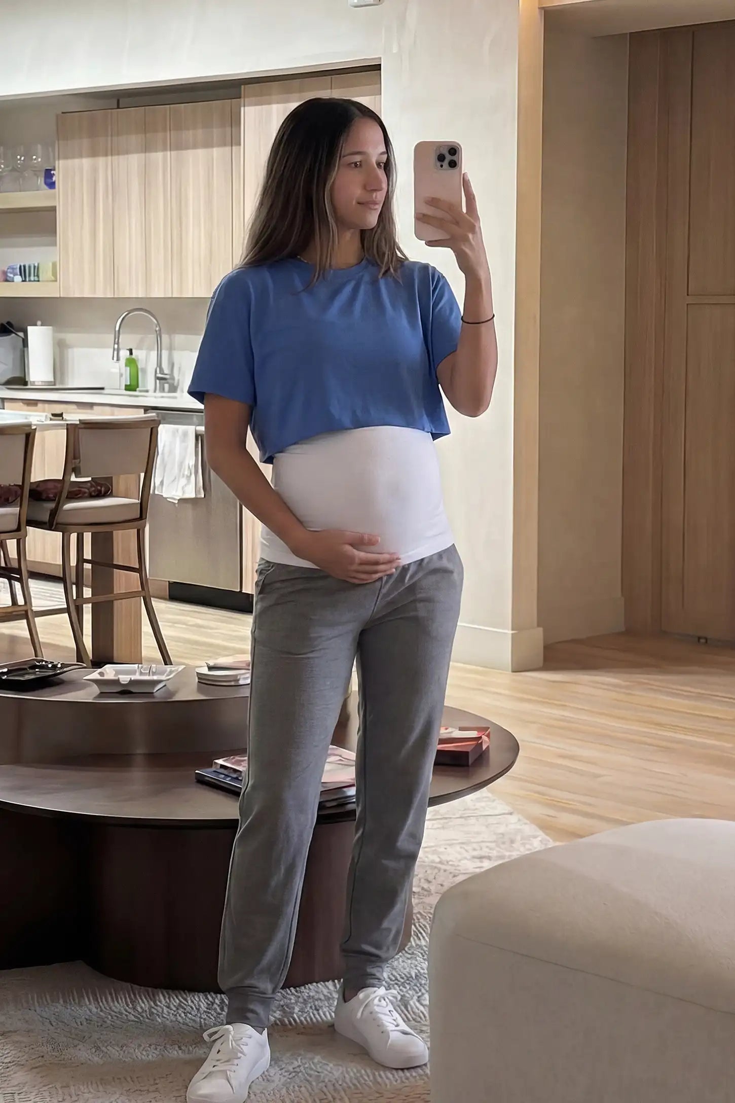 Seamless Support Maternity Belly Band Seamless Support Maternity Belly Band in white featuring wide high-rise fit and seamless tubular design on pregnant model.