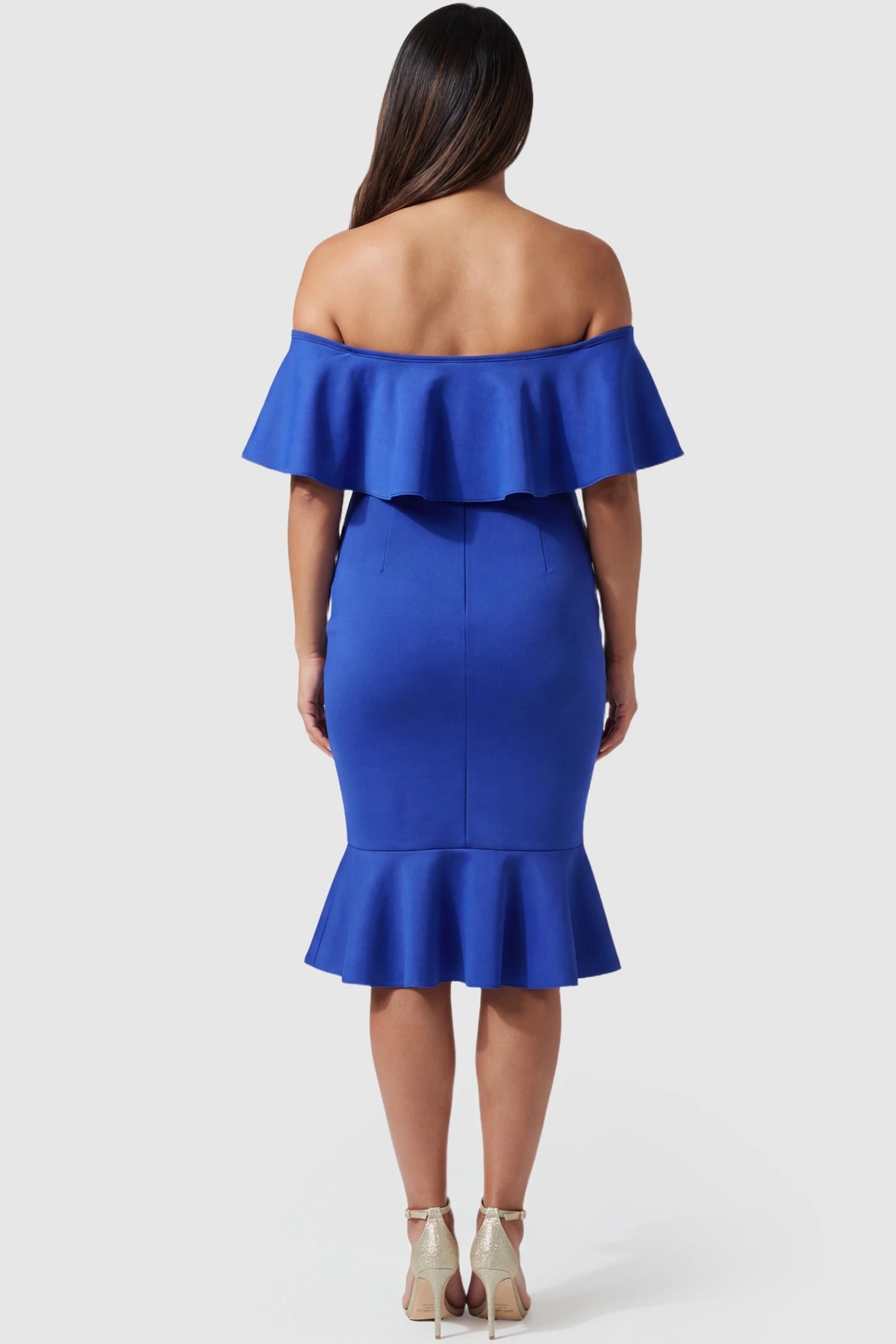 Ruffled Off-Shoulder Mermaid Hem Midi Maternity Dress Ruffled off-shoulder mermaid hem midi maternity dress in dark blue featuring elegant back ruffle detail in back view on a pregnant model