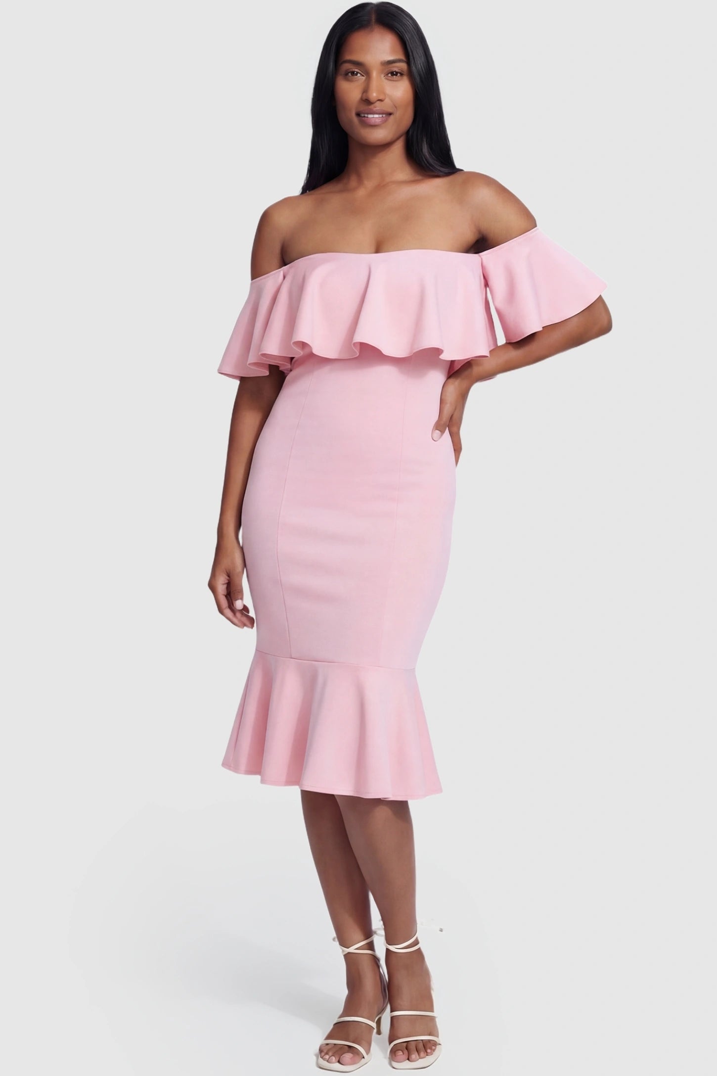 Ruffled Off-Shoulder Mermaid Hem Midi Maternity Dress Ruffled off-shoulder mermaid hem midi maternity dress in pink featuring flattering sculpted silhouette in full body view on a postpartum model