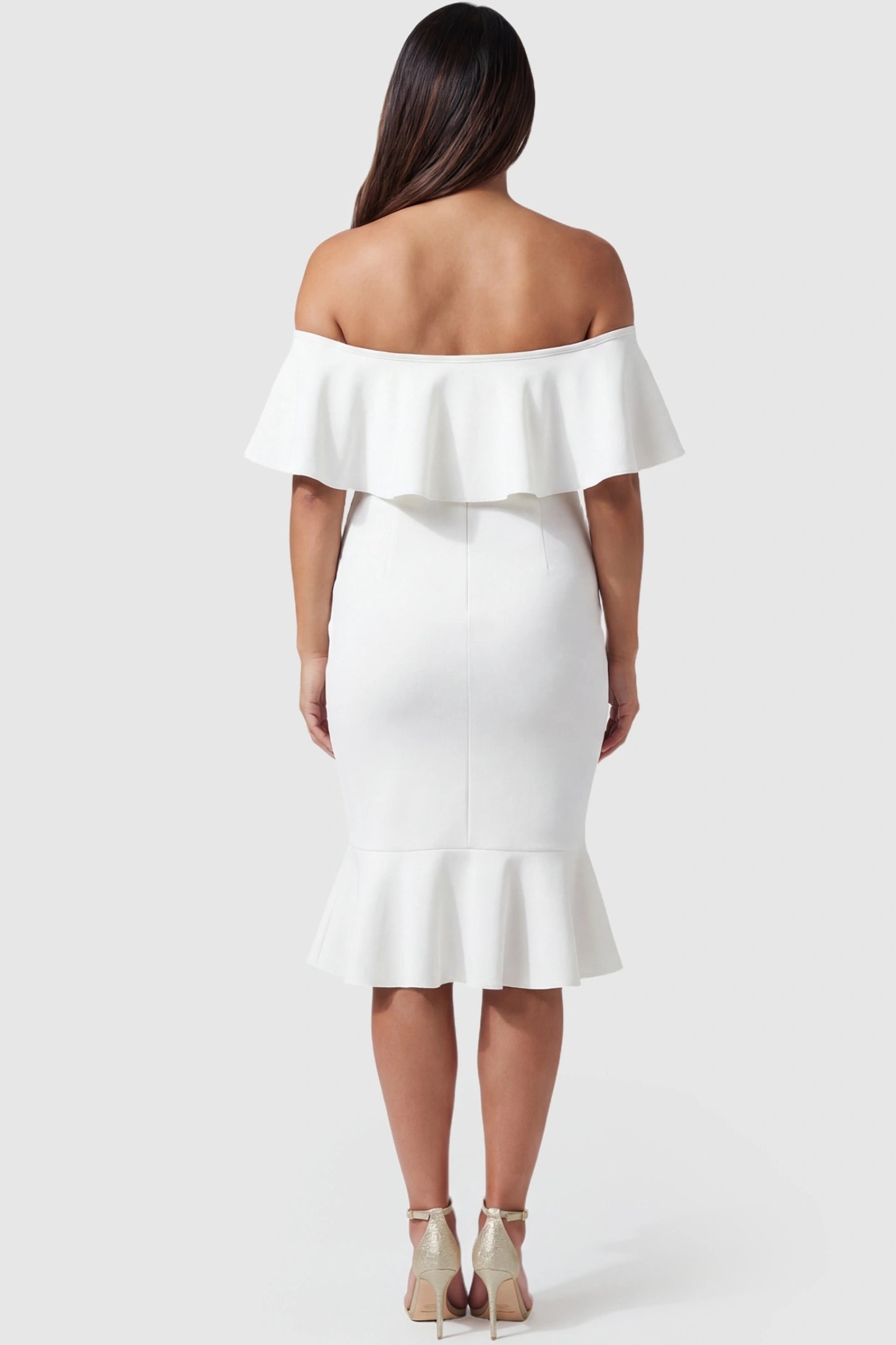 Ruffled Off-Shoulder Mermaid Hem Midi Maternity Dress Ruffled off-shoulder mermaid hem midi maternity dress in white featuring elegant back ruffle detail in back view on a pregnant model