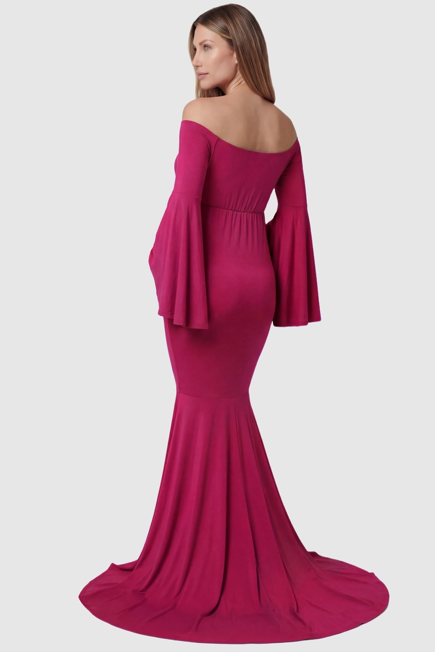 Mesh Flared Fishtail Maternity Gown Mesh Flared Fishtail Maternity Gown in Magenta featuring flared bell sleeves on a pregnant model back view.