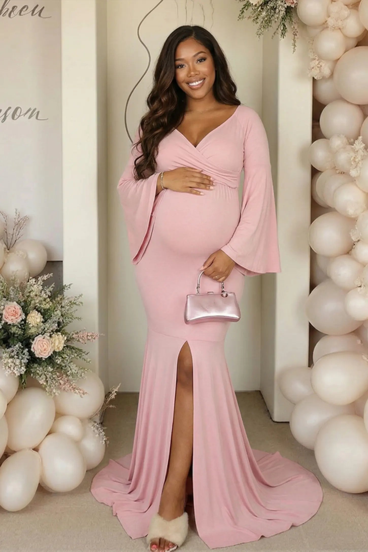 Mesh Flared Fishtail Maternity Gown Pink Mesh Flared Fishtail Maternity Gown featuring a front leg slit on a pregnant model in a front view.