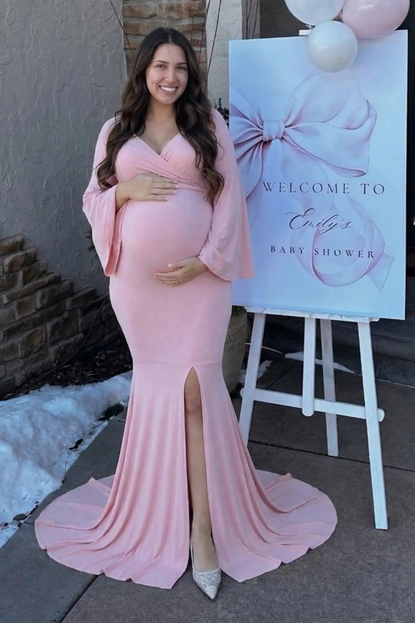 Mesh Flared Fishtail Maternity Gown Pink Mesh Flared Fishtail Maternity Gown featuring a front leg slit on a pregnant model in a front view.