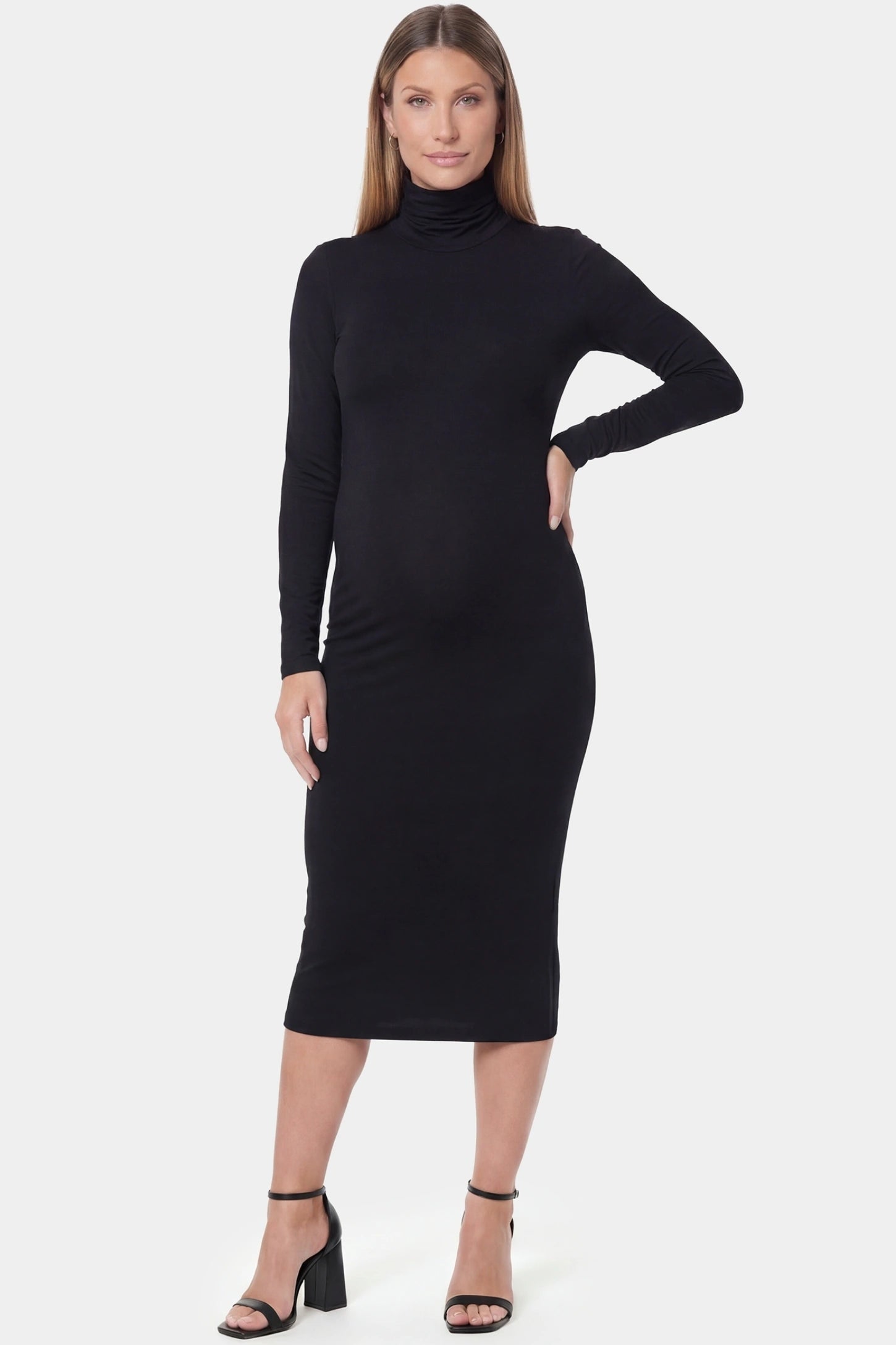 Fitted Long Sleeve Mock Neck Maxi Maternity Dress Fitted long sleeve mock neck maxi maternity dress in black with mock neckline, front view on pregnant model