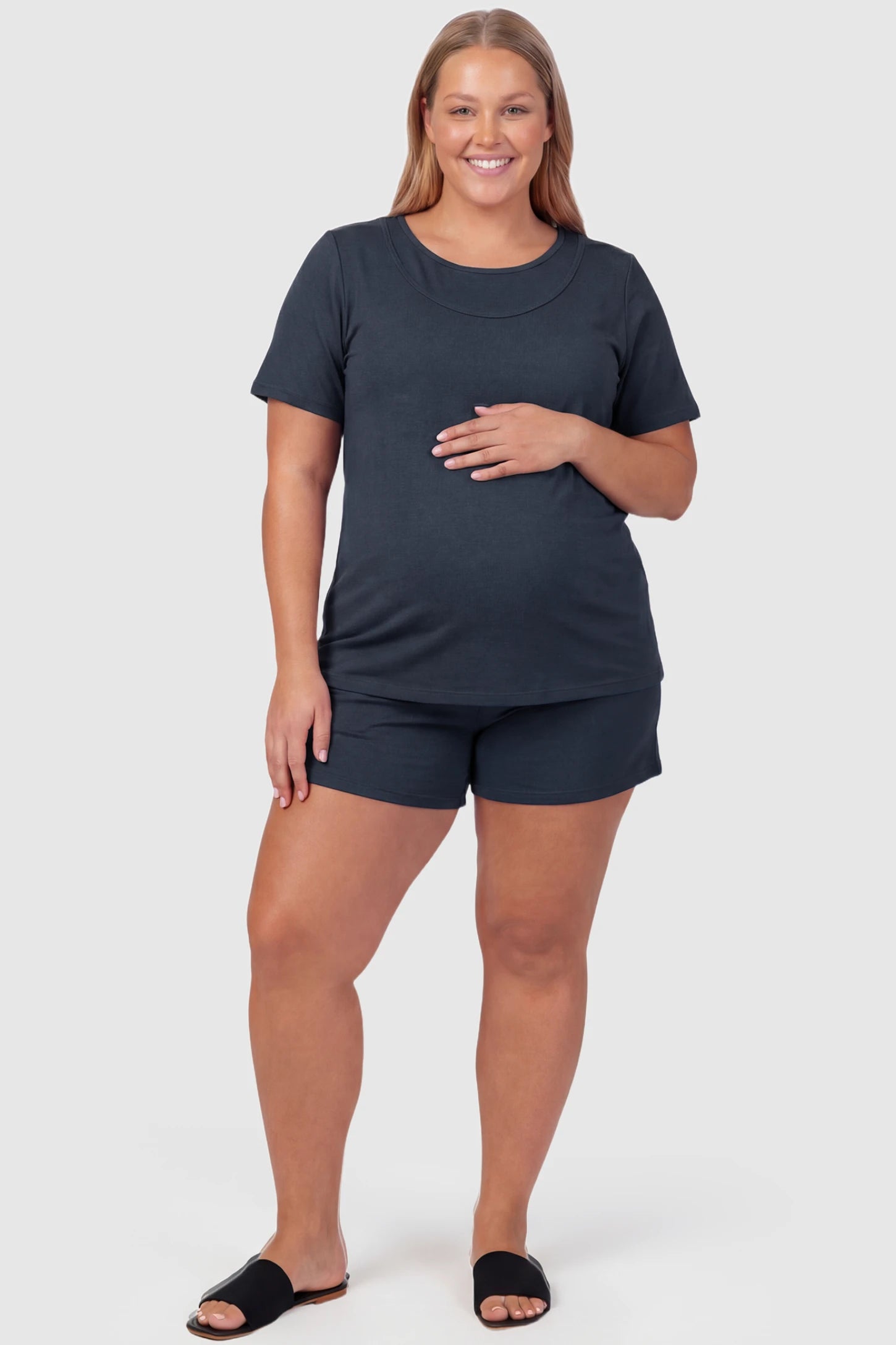 Modal Short Sleeve Maternity & Nursing Lounge Set Modal Short Sleeve Maternity Lounge Set in blue featuring round-neck top, and relaxed shorts on plus size pregnant model.
