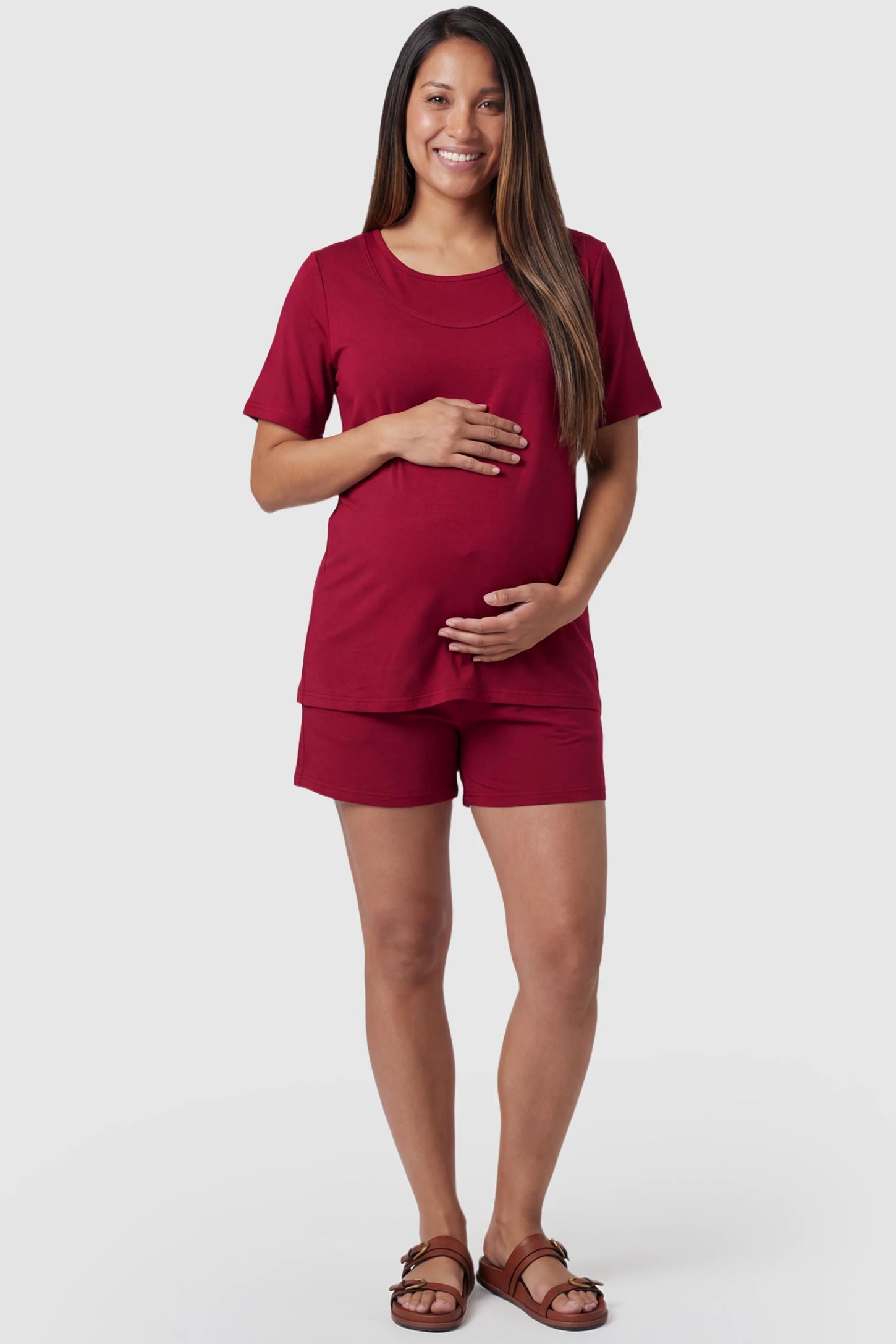 Modal Short Sleeve Maternity & Nursing Lounge Set Modal Short Sleeve Maternity Lounge Set in burgundy featuring round-neck top, and relaxed shorts on pregnant model.