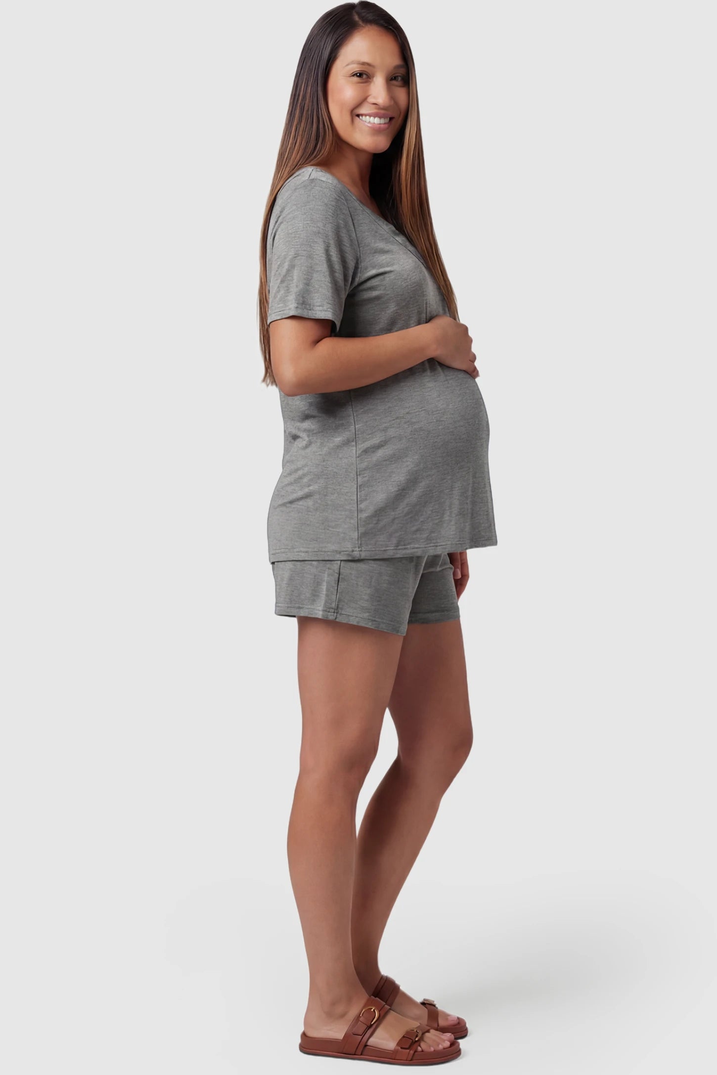 Modal Short Sleeve Maternity & Nursing Lounge Set Modal Short Sleeve Maternity Lounge Set in gray featuring round-neck top, and relaxed shorts on pregnant model.