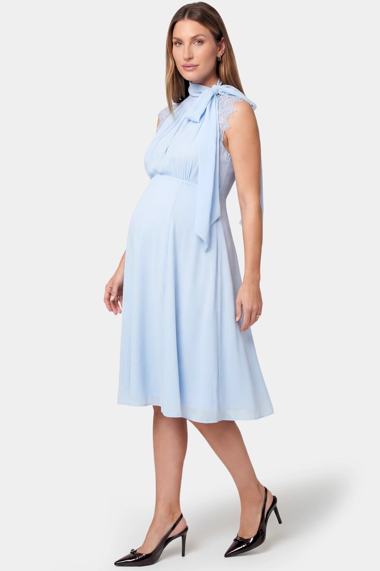 Lace Shoulder Halter Neck Maternity & Nursing Midi Dress in light blue featuring lace cap shoulders and empire waist on pregnant model.