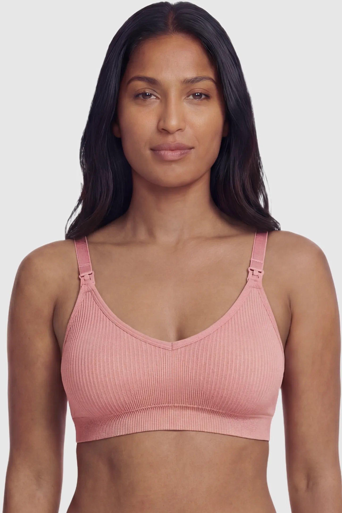 Ribbed Wireless Adjustable Shoulder Strap Nursing Bra Ribbed wireless adjustable strap nursing bra in bean paste with stretchy fabric, front view on postpartum model