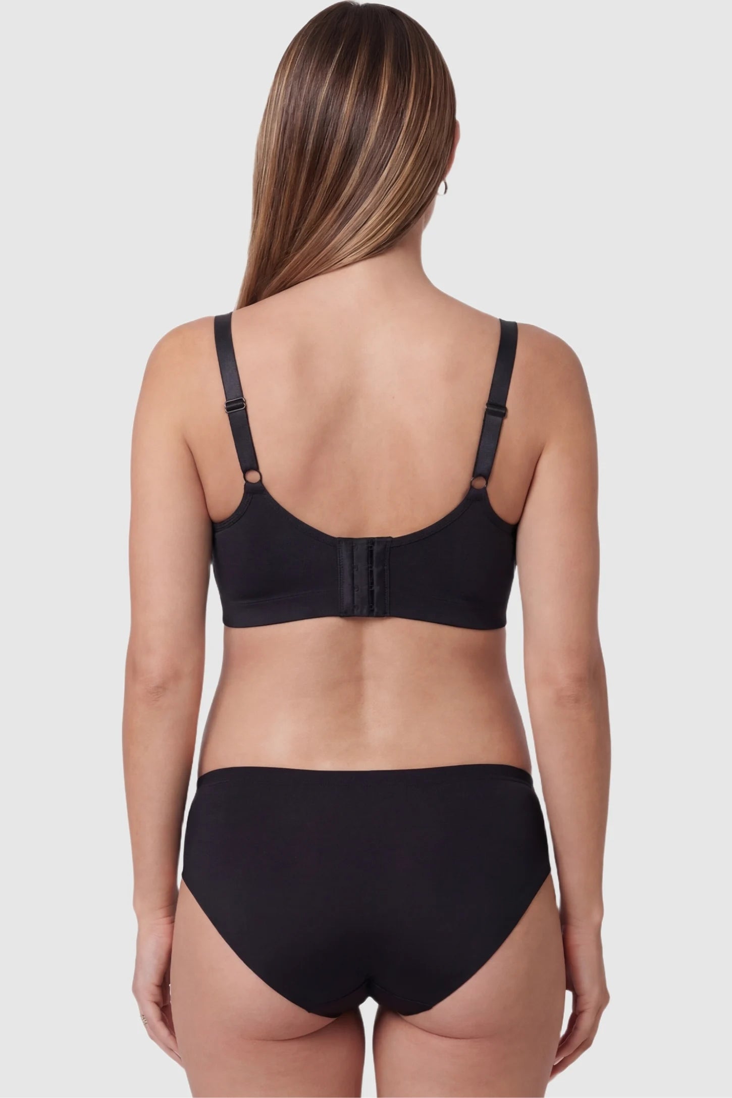 Embroidered Lace Wire-free Front-Open Nursing Bra Embroidered lace wire-free front-open nursing bra in black with adjustable hook closure, back view on pregnant model