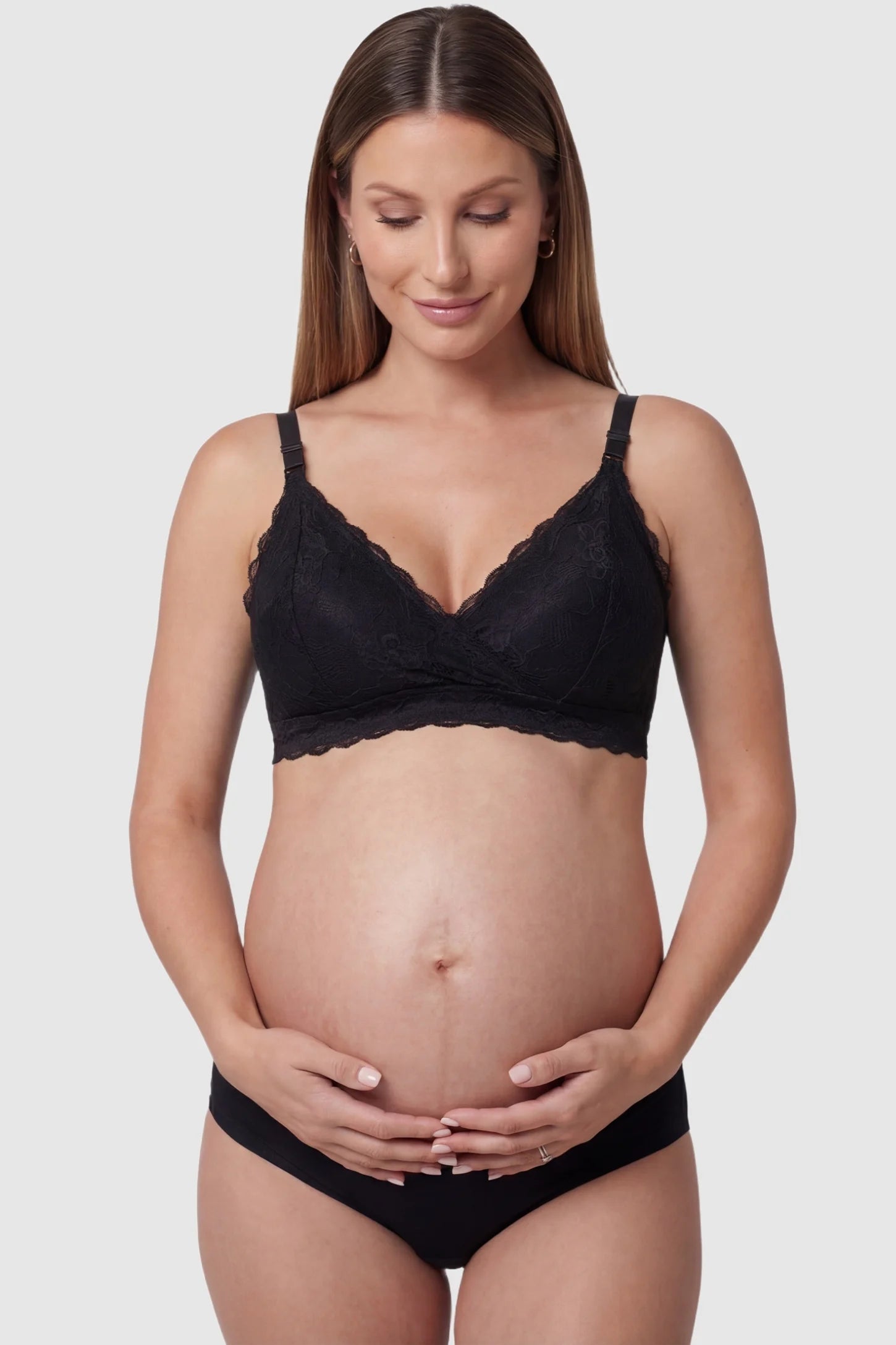 Embroidered Lace Wire-free Front-Open Nursing Bra Embroidered lace wire-free front-open nursing bra in black with breathable lace, front view on pregnant model