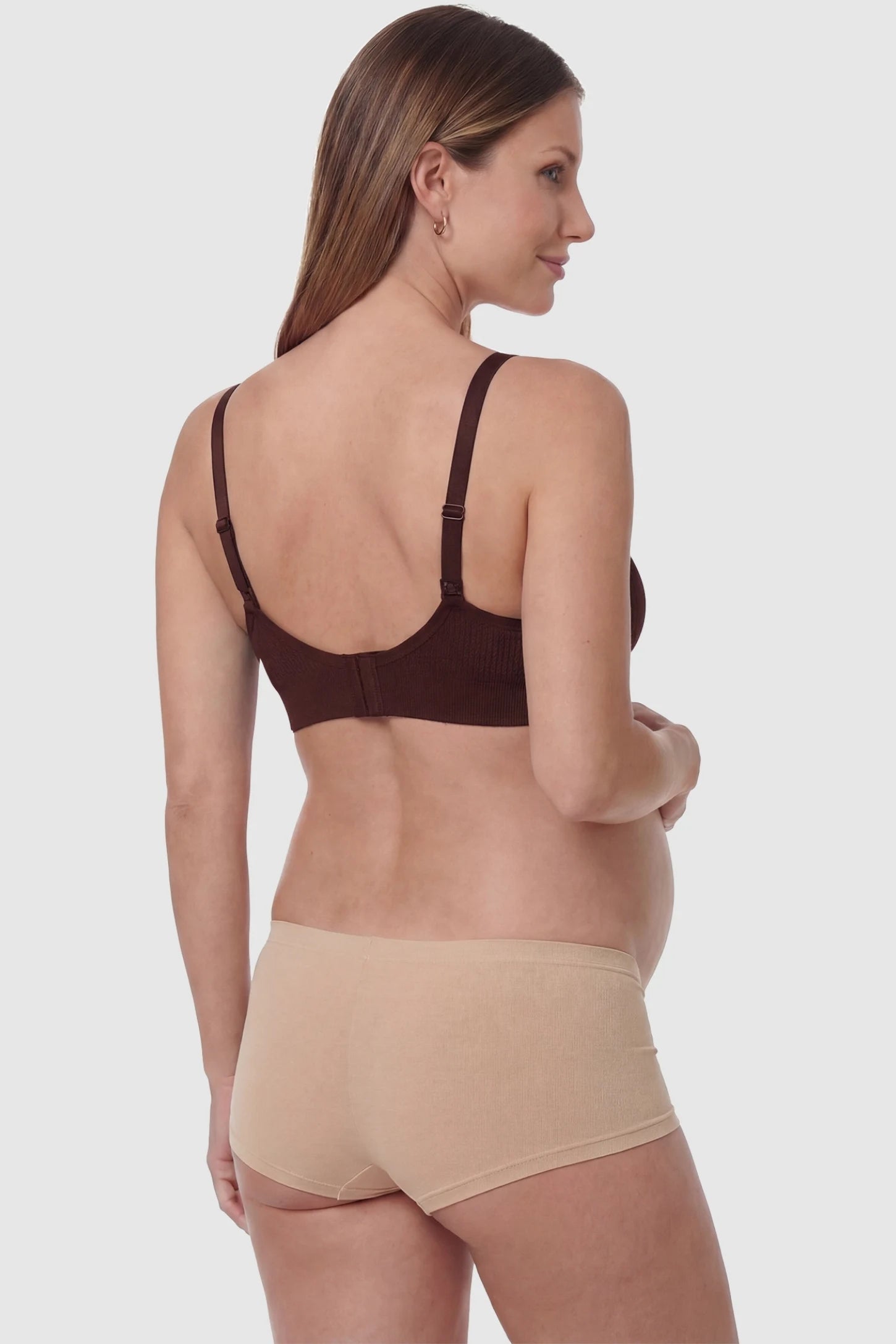 Full-Flap Seamless Top-Opening Nursing Bra Full-flap seamless top-opening nursing bra in coffee with invisible back buckle, back view on pregnant model