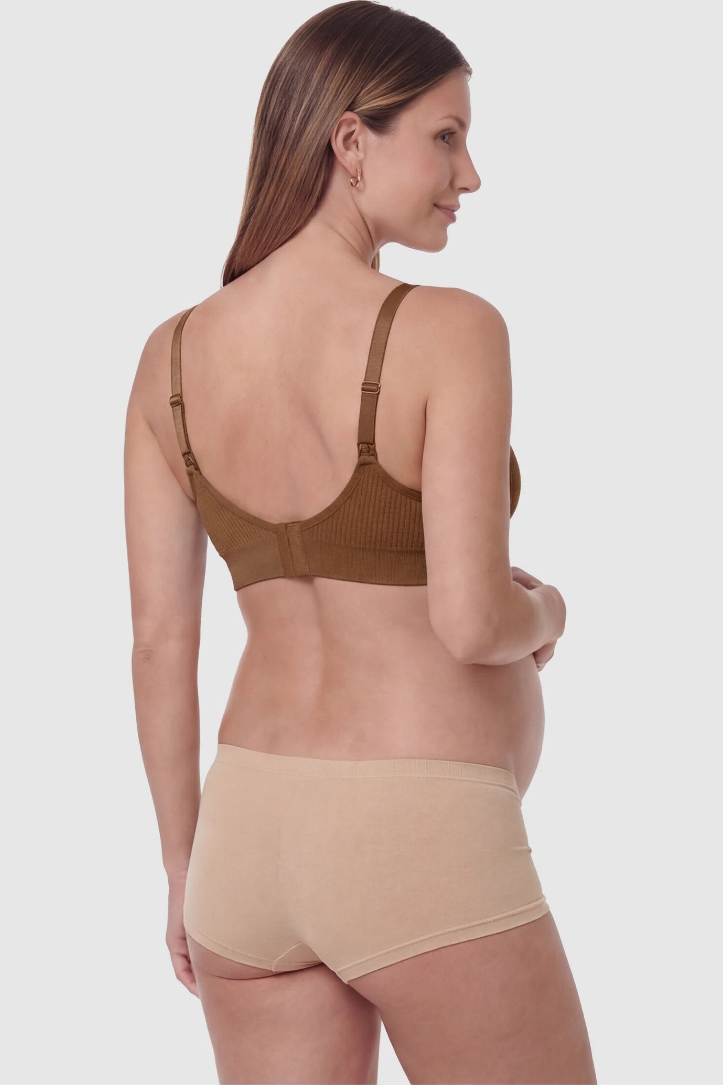 Full-Flap Seamless Top-Opening Nursing Bra Full-flap seamless top-opening nursing bra in dark brown with invisible back buckle, back view on pregnant model