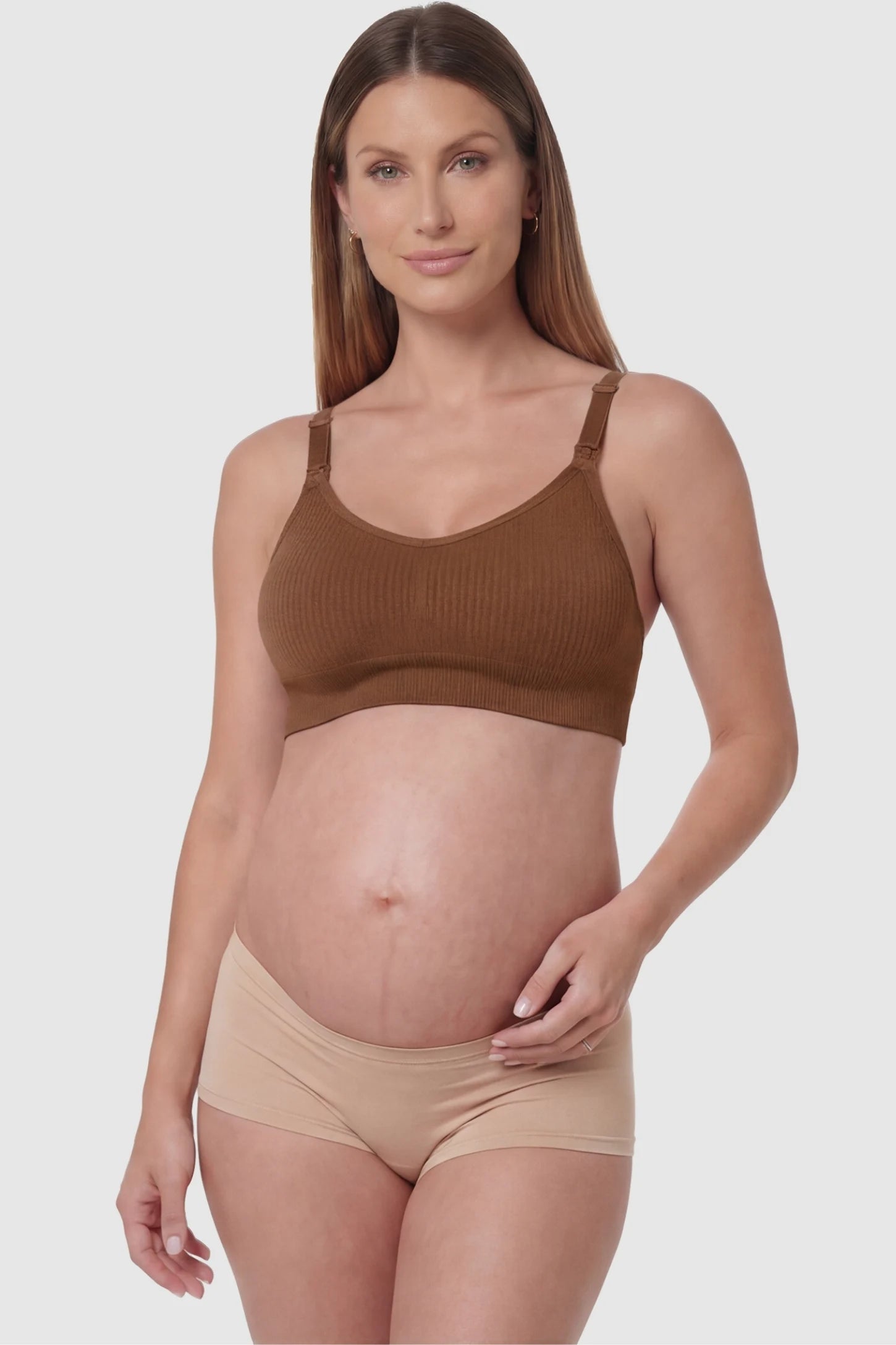 Full-Flap Seamless Top-Opening Nursing Bra Full-flap seamless top-opening nursing bra in dark brown with 3D support, front view on pregnant model