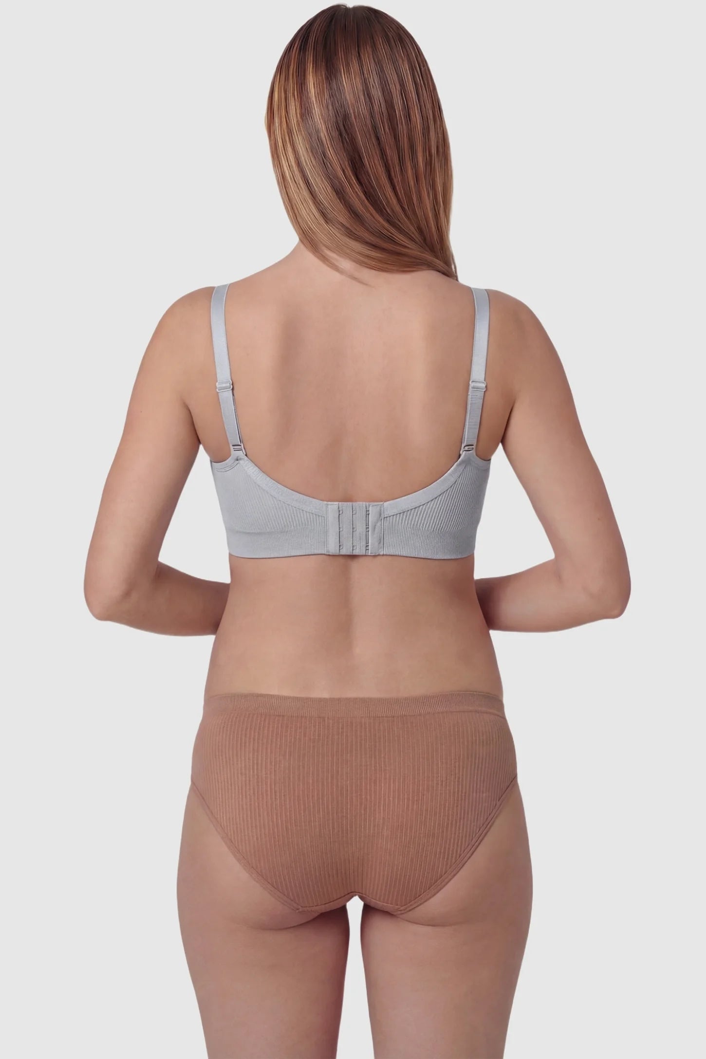 Ribbed Wireless Adjustable Shoulder Strap Nursing Bra Ribbed wireless adjustable strap nursing bra in gray with wire-free support, back view on pregnant model