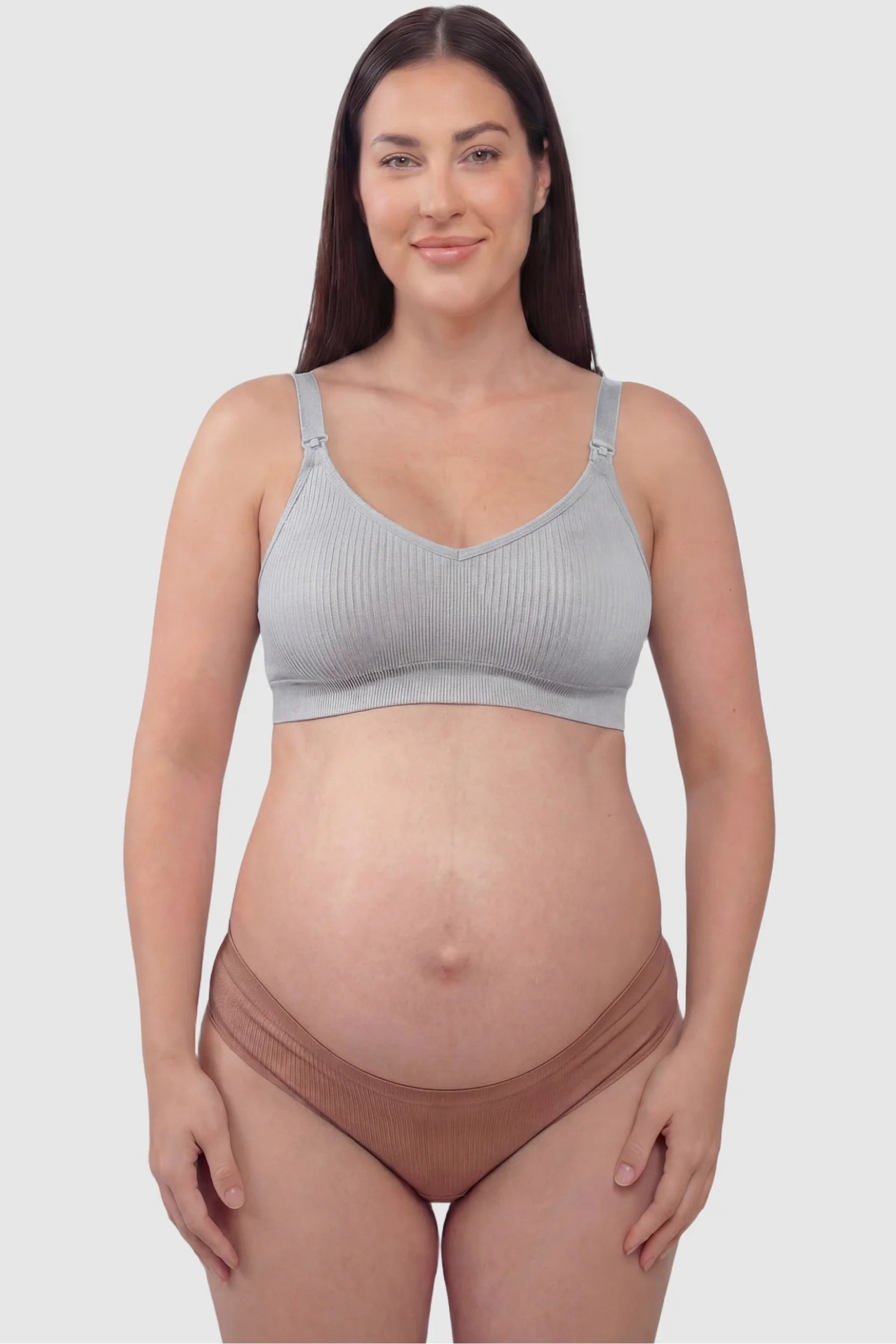 Ribbed Wireless Adjustable Shoulder Strap Nursing Bra Ribbed wireless adjustable strap nursing bra in gray with stretchy fabric, front view on plus-size model