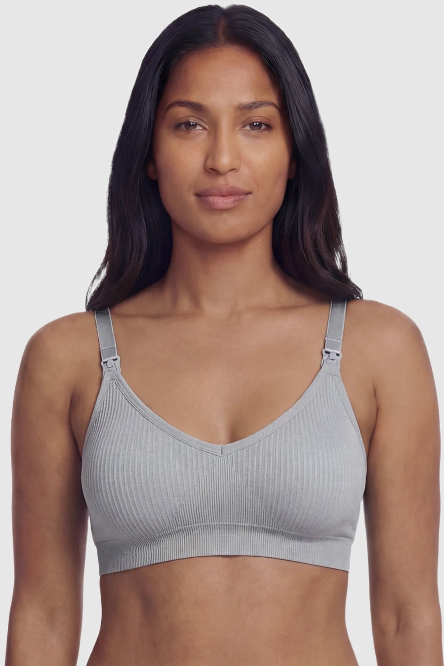 Ribbed Wireless Adjustable Shoulder Strap Nursing Bra Ribbed wireless adjustable strap nursing bra in gray with stretchy fabric, front view on postpartum model