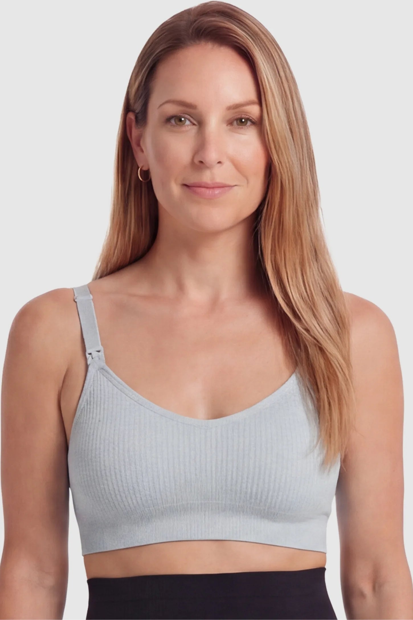 Full-Flap Seamless Top-Opening Nursing Bra Full-flap seamless top-opening nursing bra in light gray with breathable anti-leakage design, full body on postpartum model