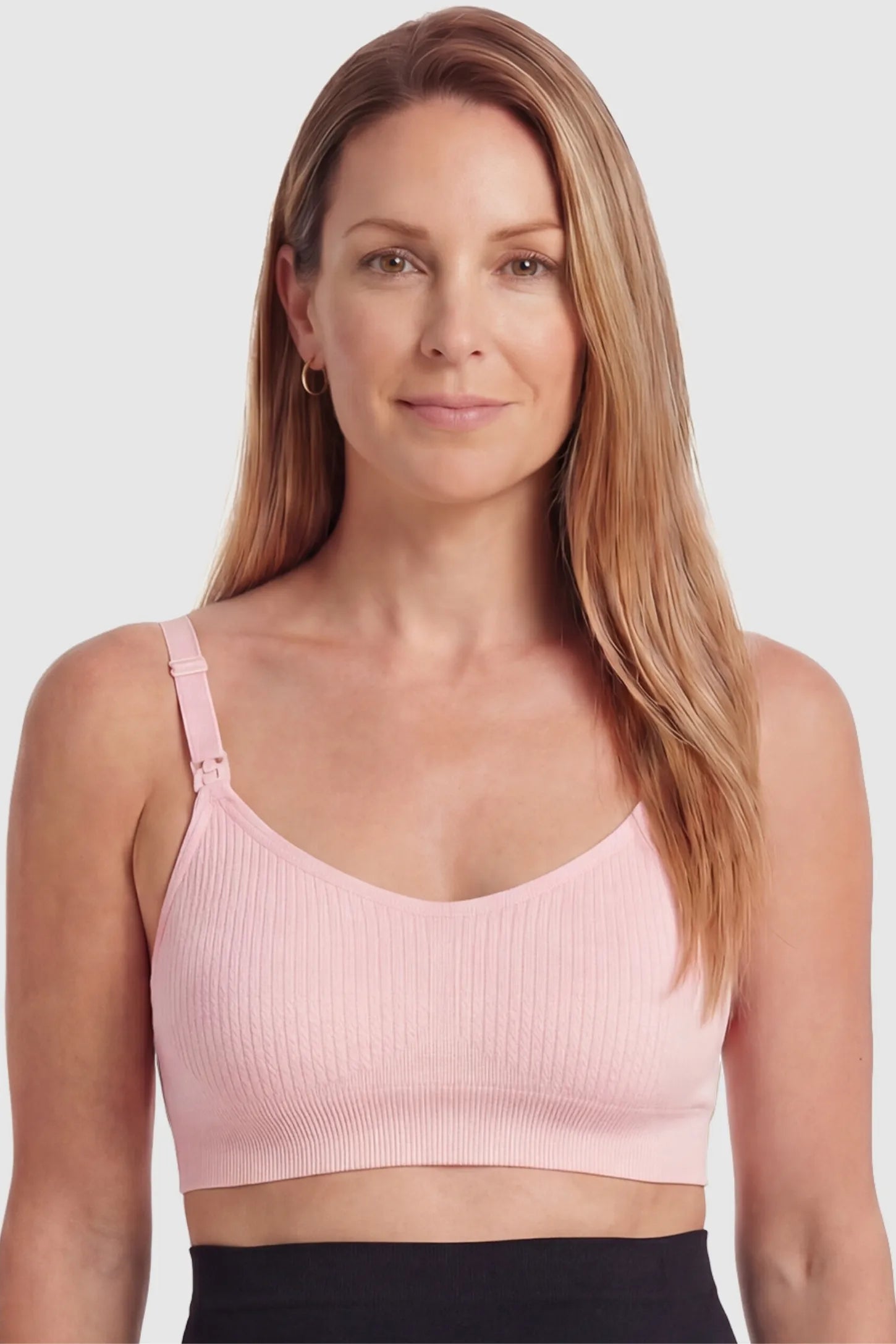 Full-Flap Seamless Top-Opening Nursing Bra Full-flap seamless top-opening nursing bra in light pink with breathable anti-leakage design, full body on postpartum model