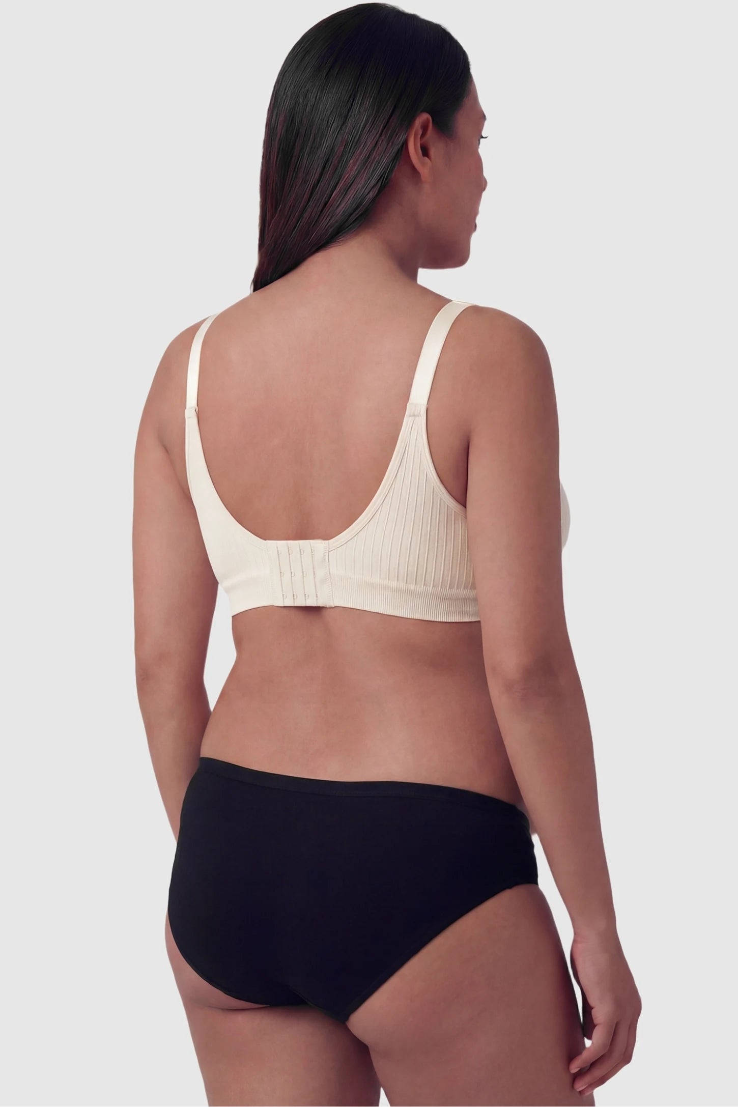 Seamless Front-Open Cross Wireless Nursing Bra Seamless front-open cross wireless nursing bra in nude with wire-free design, back view on pregnant model