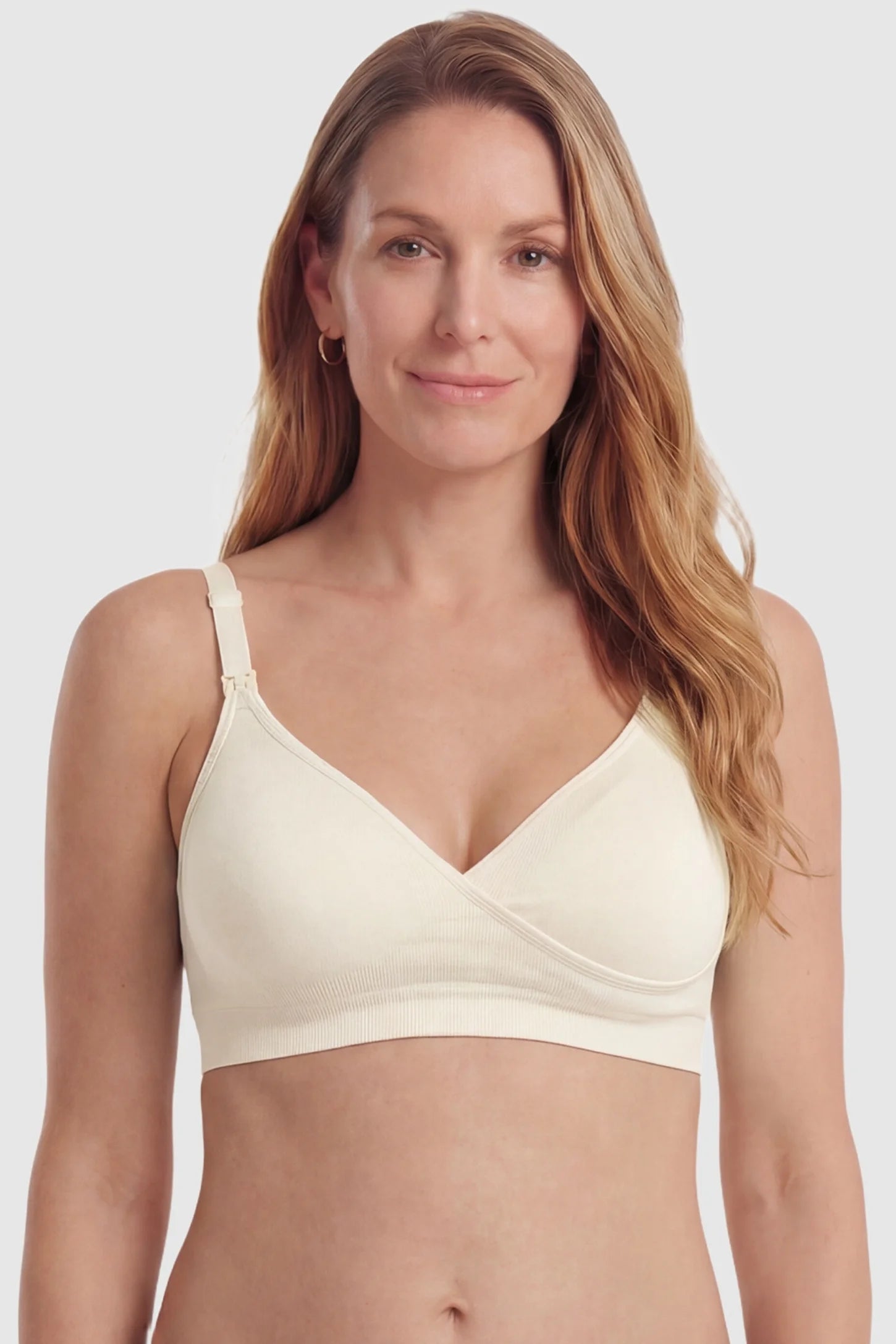 Seamless Front-Open Cross Wireless Nursing Bra Seamless front-open cross wireless nursing bra in nude with flexible support, full body on postpartum model