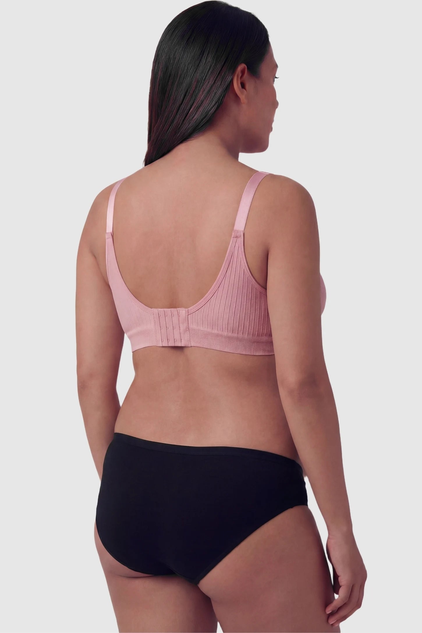 Seamless front-open cross wireless nursing bra in peach red with wire-free design, back view on pregnant model