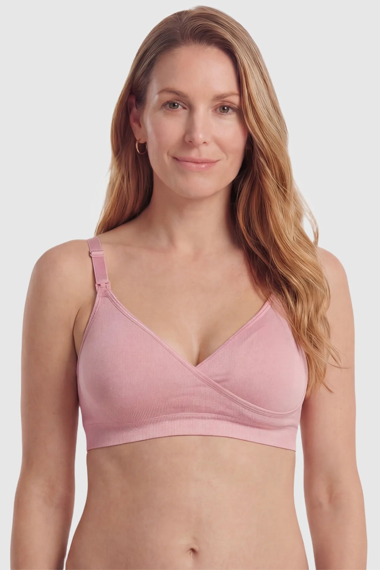 Seamless Front-Open Cross Wireless Nursing Bra Seamless front-open cross wireless nursing bra in peach red with flexible support, full body on postpartum model