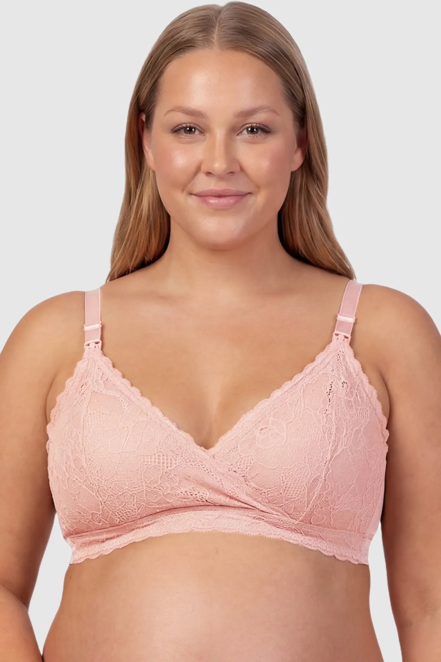 Embroidered Lace Wire-free Front-Open Nursing Bra Embroidered lace wire-free front-open nursing bra in pink with breathable lace, front view on plus-size model