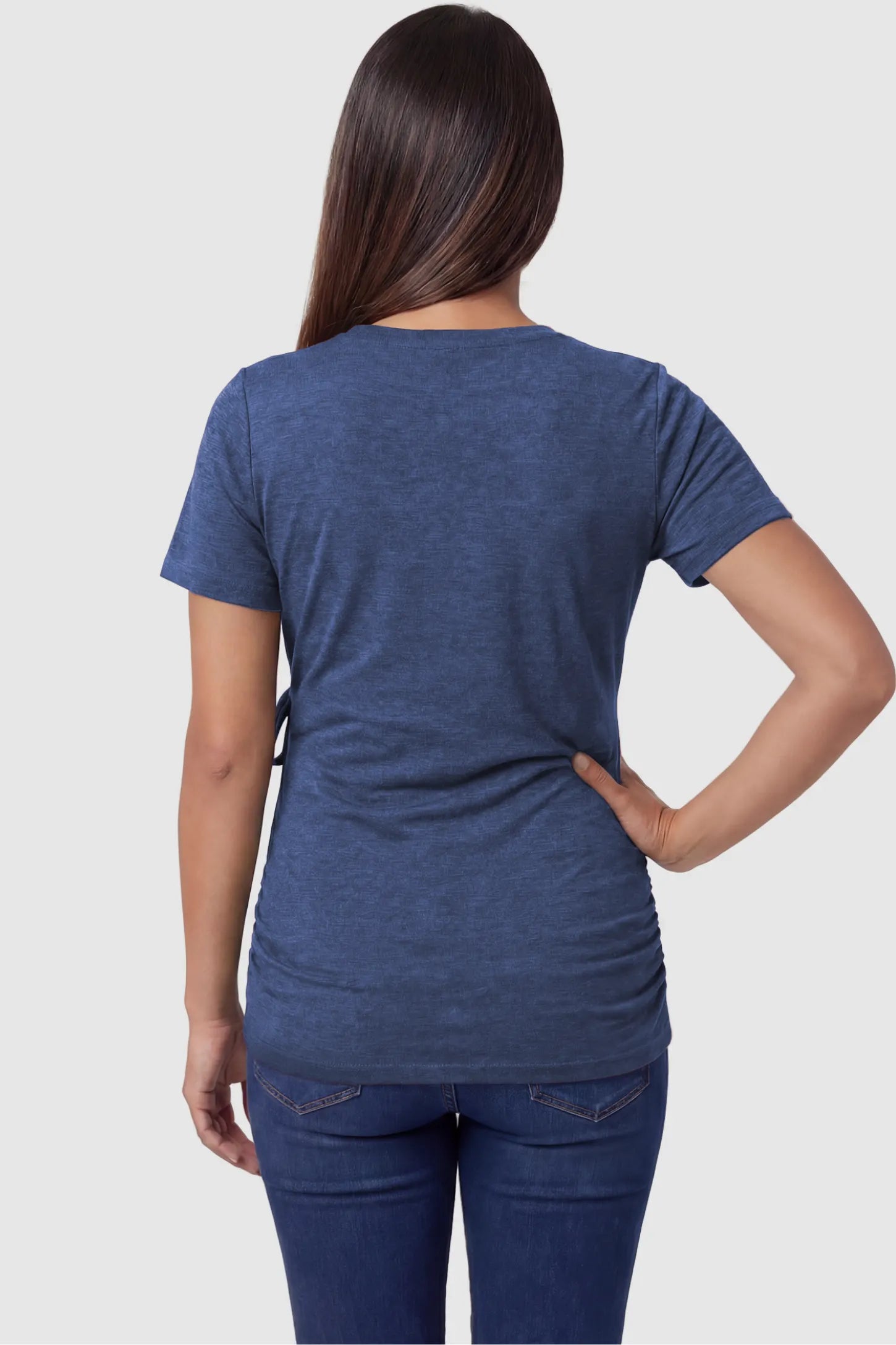 Nursing Access V-Neck Wrap Maternity & Nursing Top Nursing access V-neck wrap maternity and nursing top in blue with short sleeves, back view on pregnant model